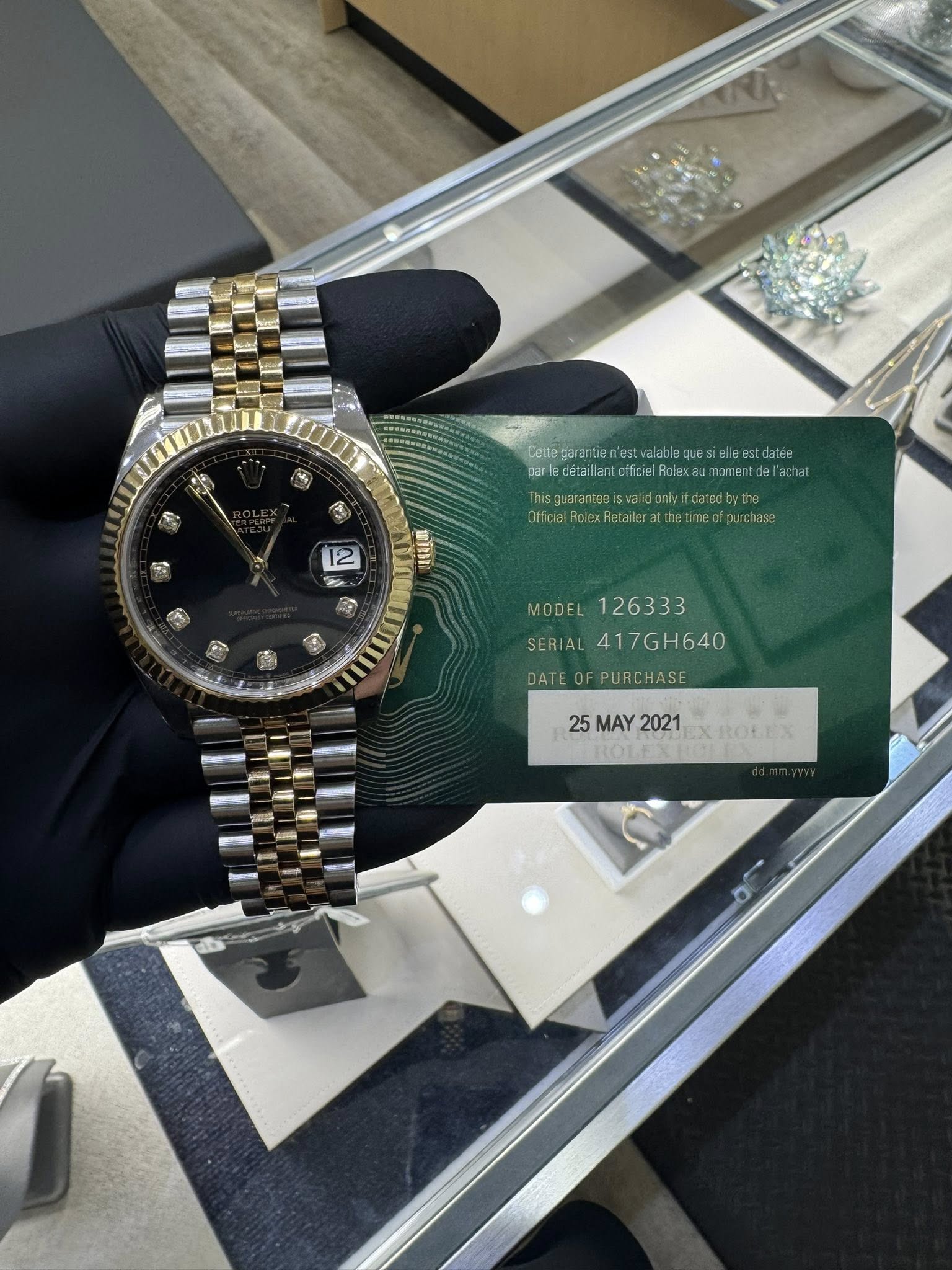 May be an image of wrist watch and text