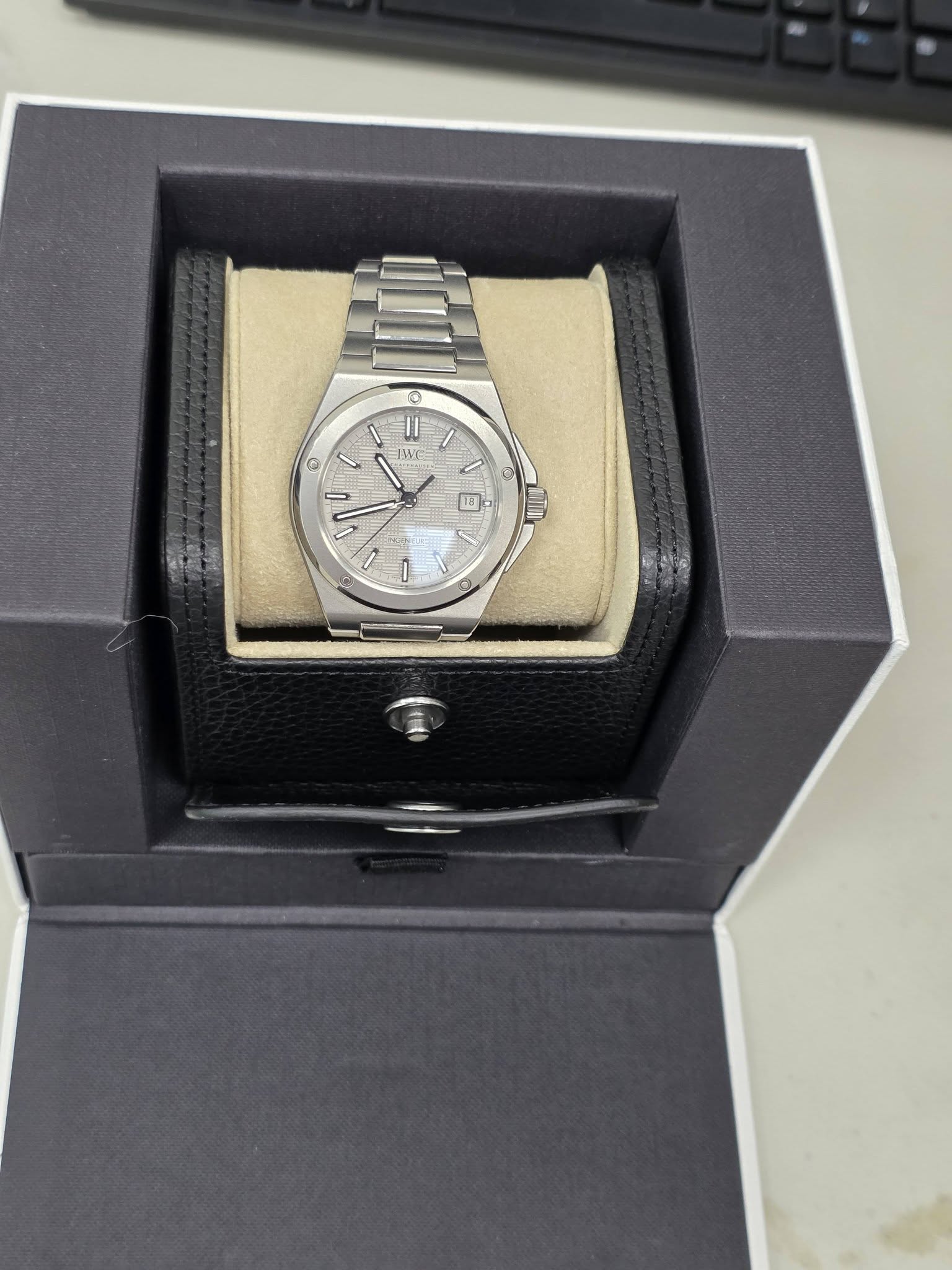 May be an image of wrist watch and text