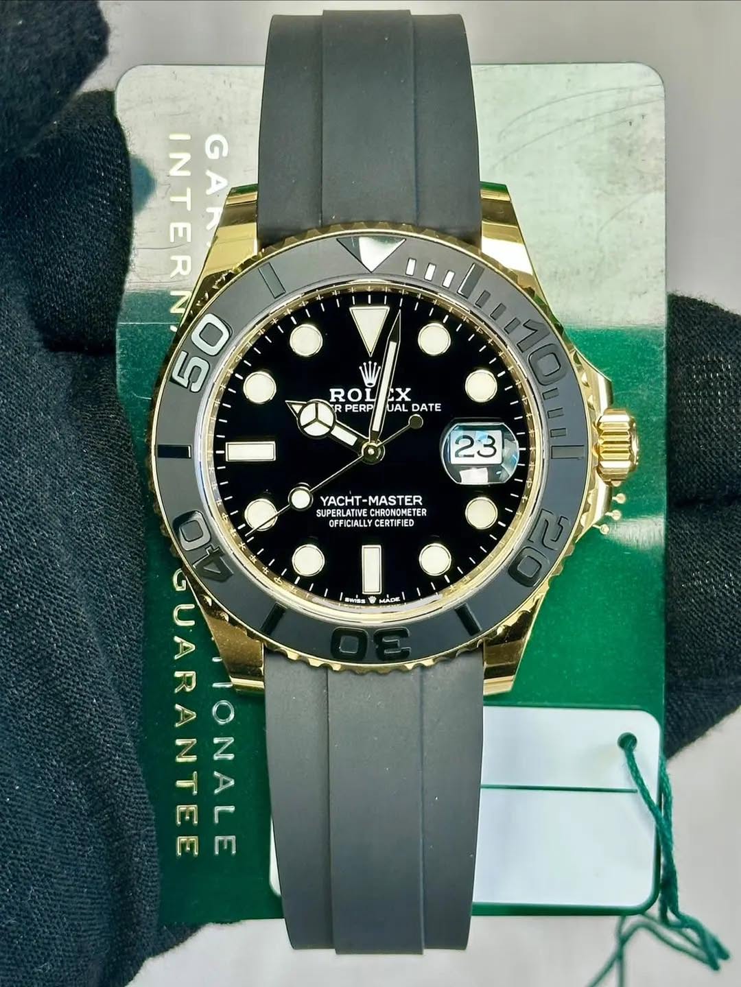 May be an image of wrist watch and text that says 'NITEN R INT G E 50 NIZz ROI CX R PERP JAL DATE 23 YACHT- -MASTER SUPERLATIVE ERLATIVECHRONONETE CHRONONETER TER OFFICIALLY…