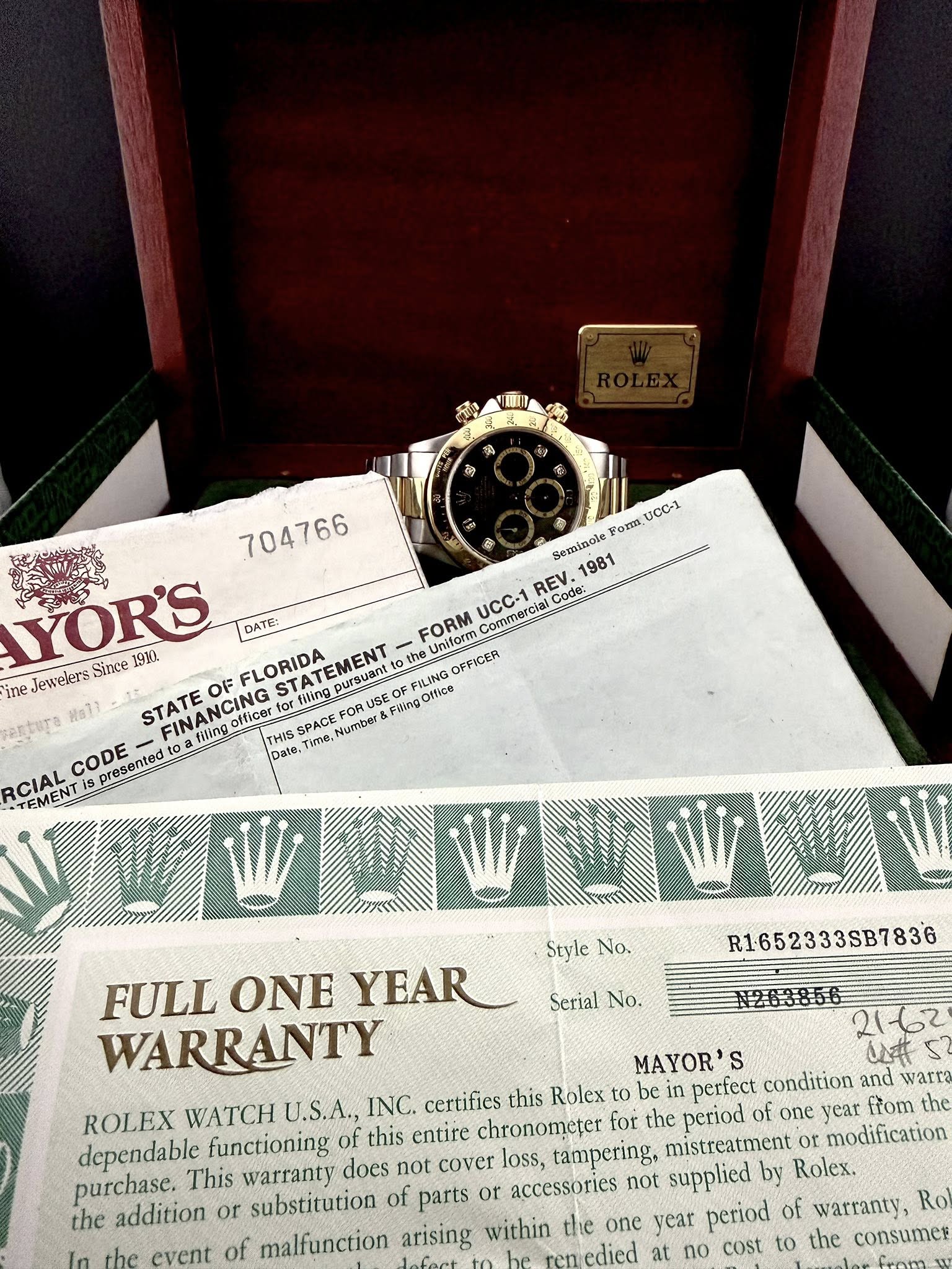 May be an image of wrist watch, grandfather clock and text that says '704766 UCC-1 Fom 1981 YOR'S DATE: REV. Code: UCC-1 FORM Uniform OFFICER ommercial ine Jewelers Since 1910…