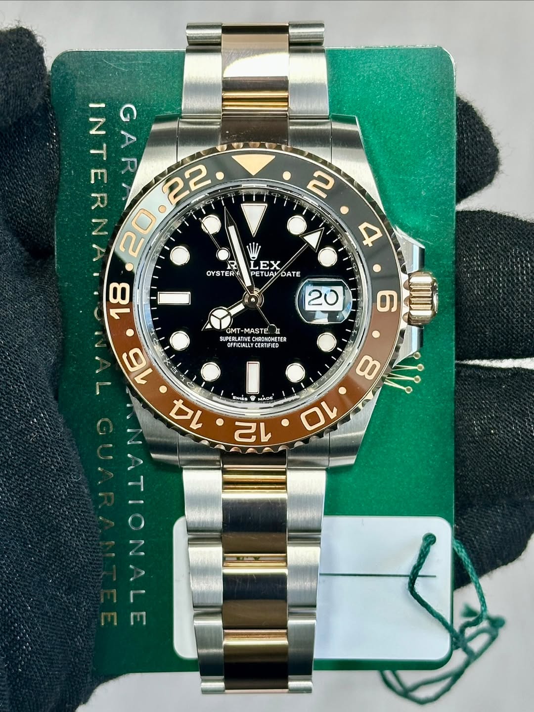 May be an image of wrist watch and text