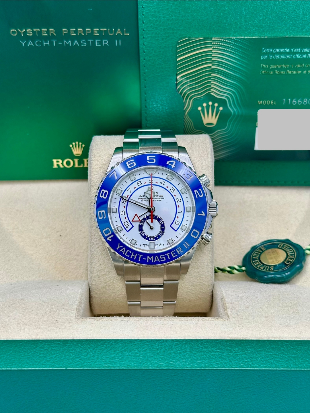 May be an image of wrist watch and text that says 'OYSTERPERPETUAL OYSTER PERPETUAL YACHT-MASTER 11 Cette garantie 'est vela par iedetaillantafficel Thisguarantee1svalid…