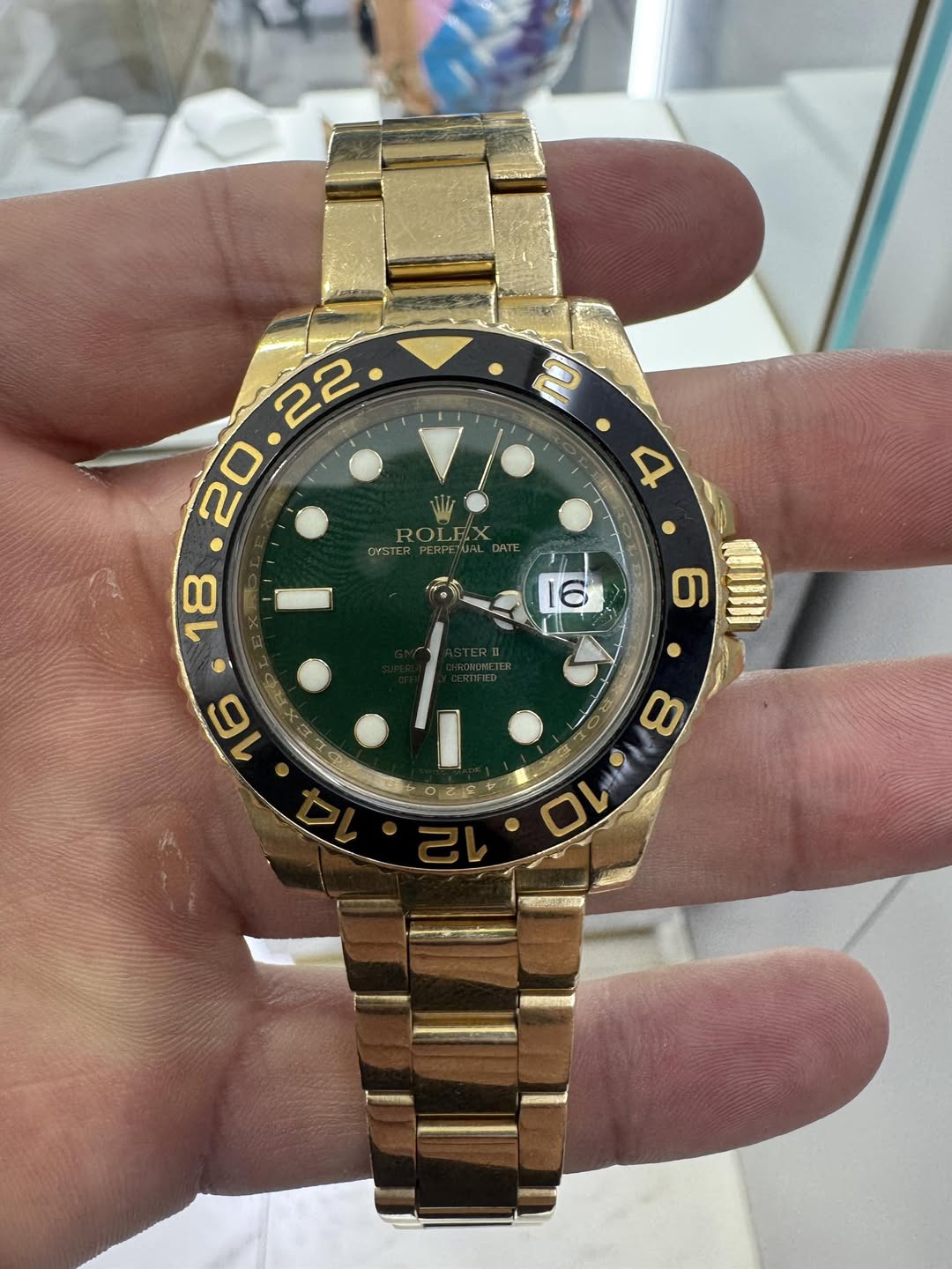 May be an image of wrist watch and text