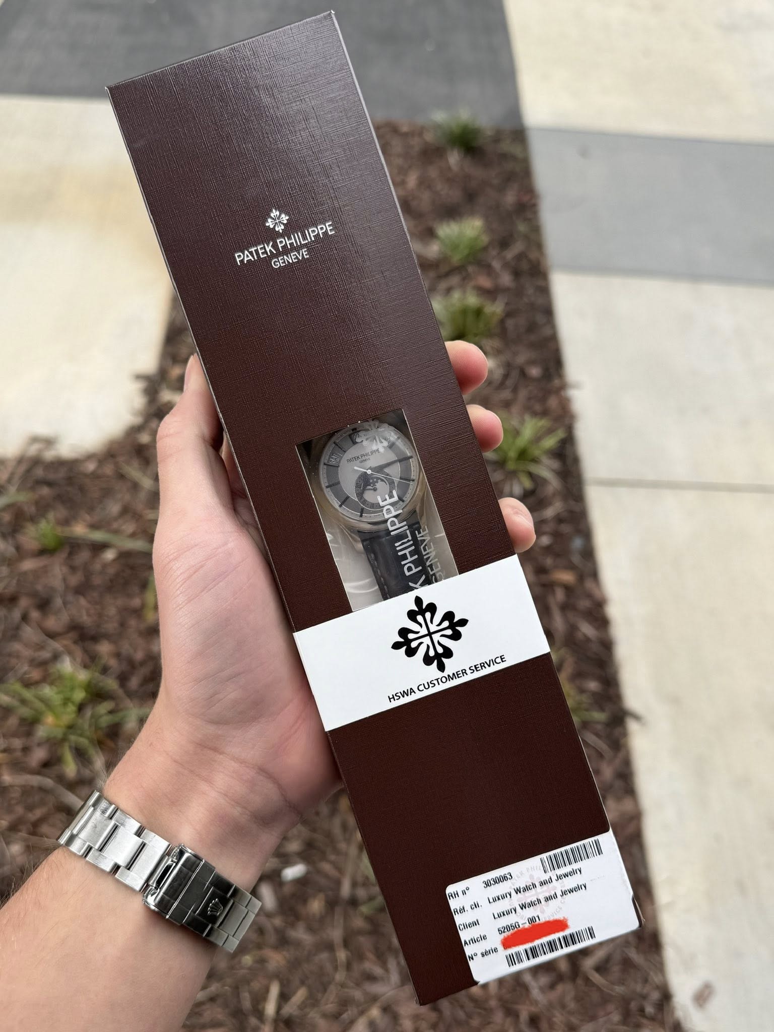 May be an image of digital watch and text