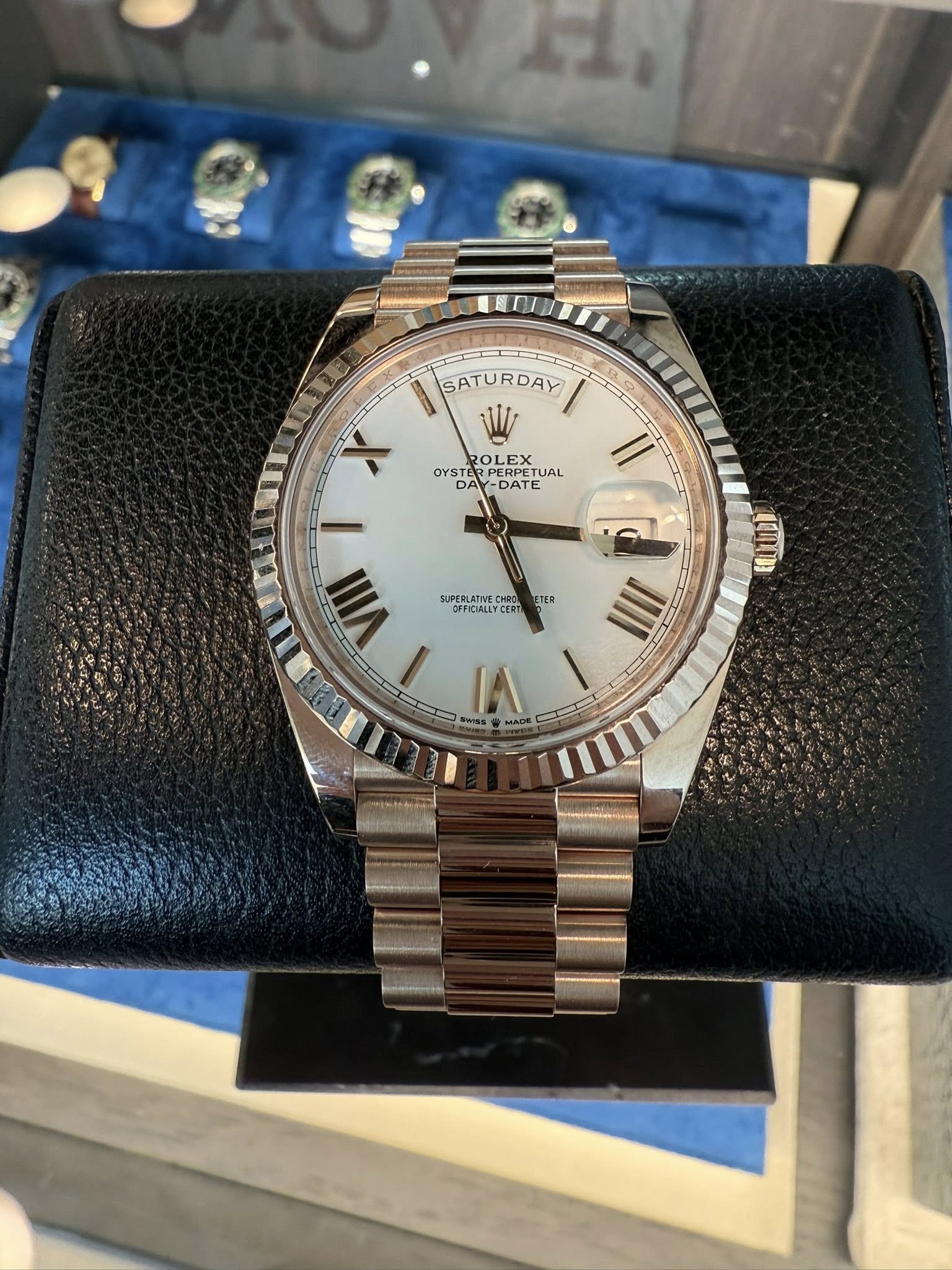 May be an image of wrist watch and text