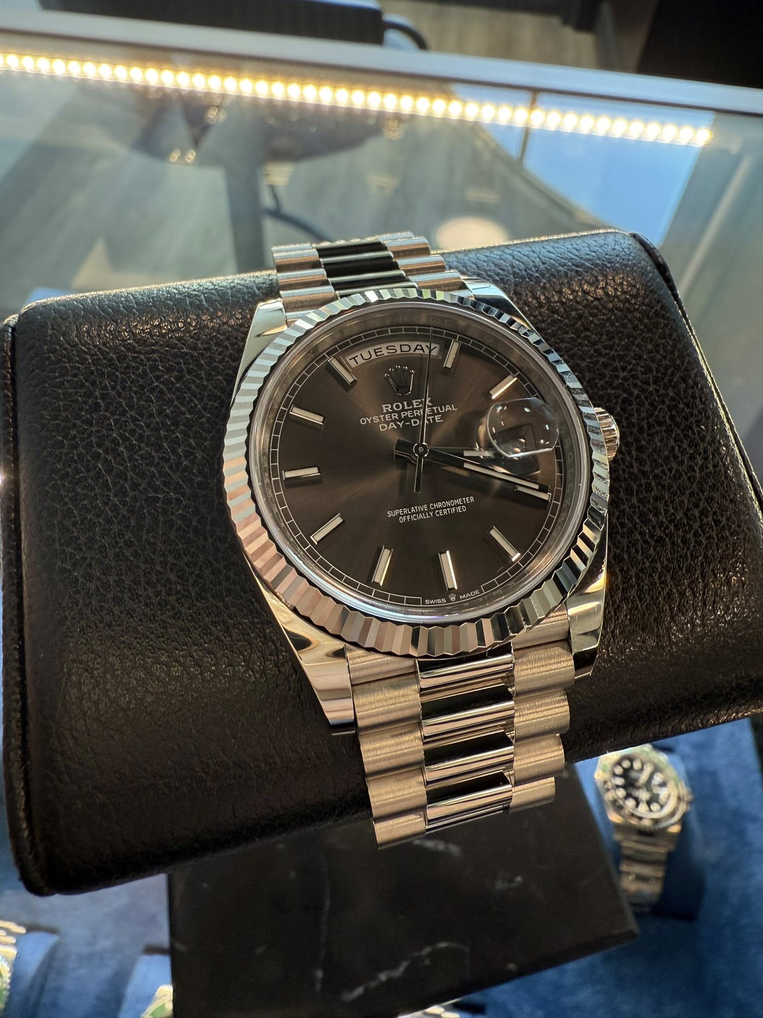 May be an image of wrist watch and text