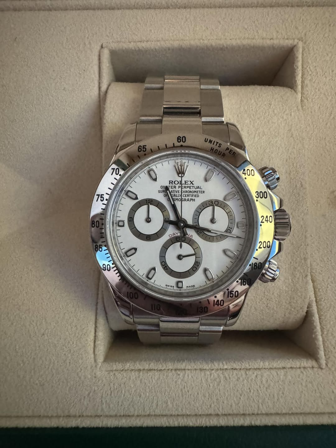 May be an image of wrist watch and text