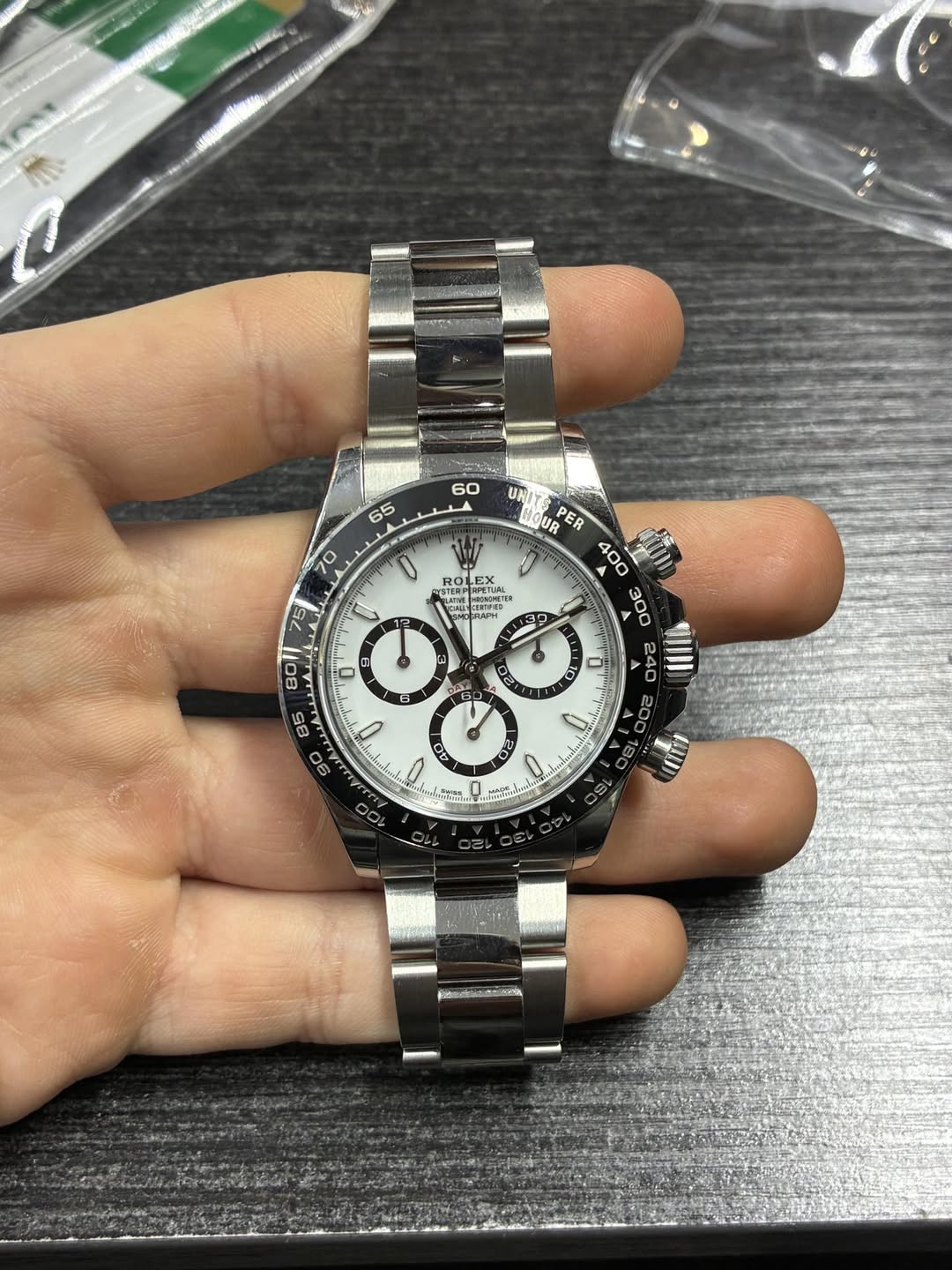 May be an image of wrist watch and text