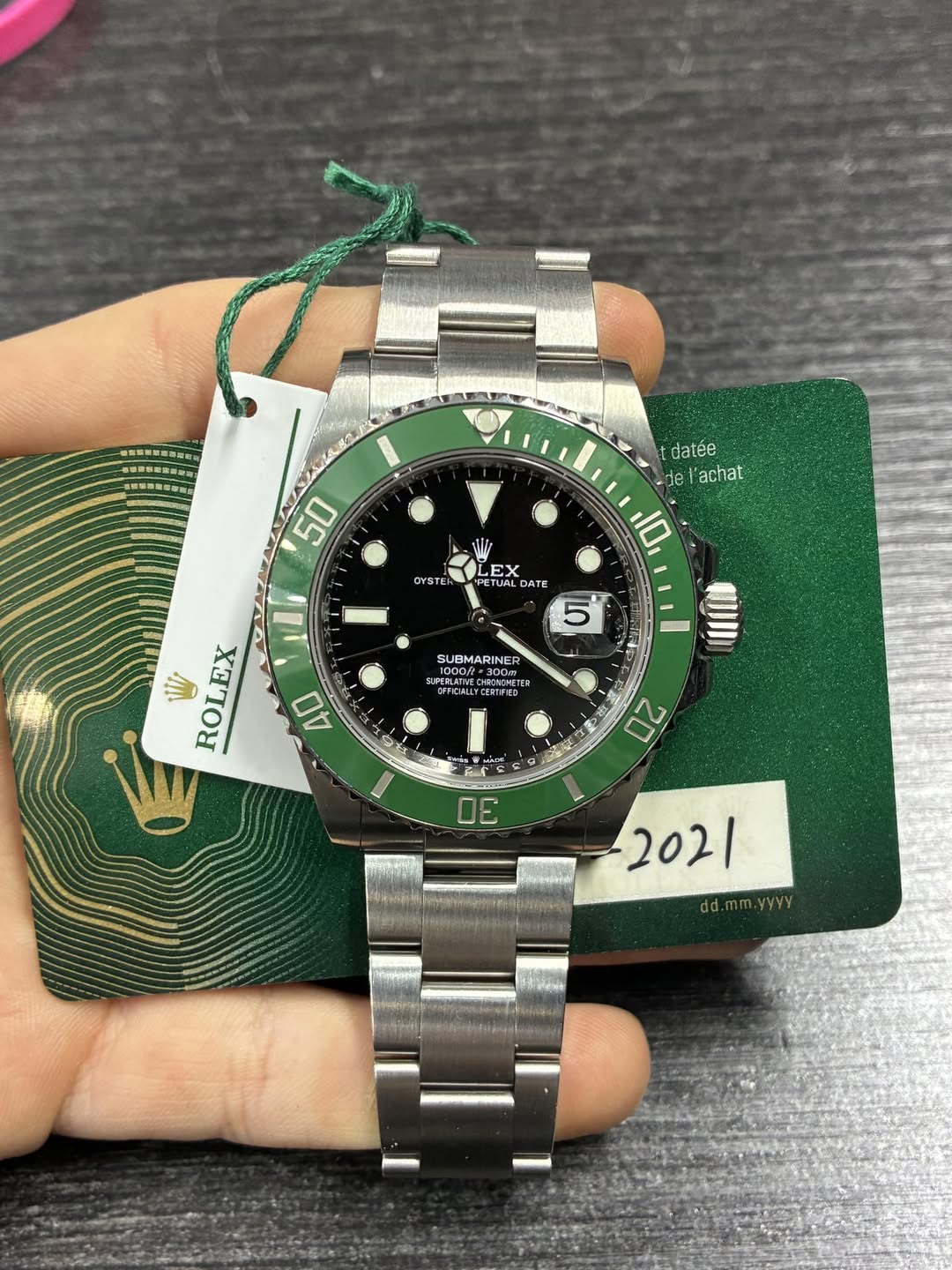 May be an image of wrist watch and text