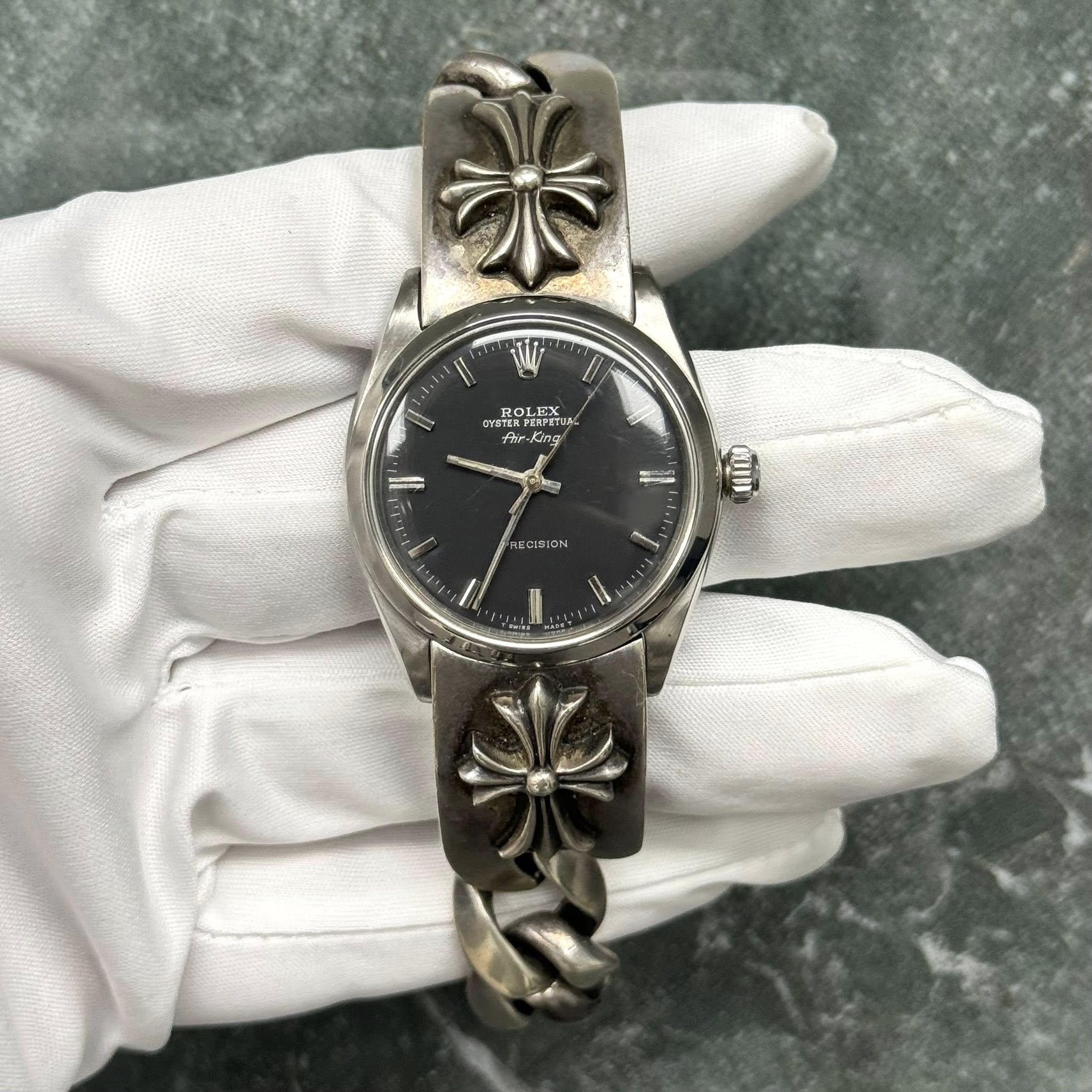 May be an image of wrist watch