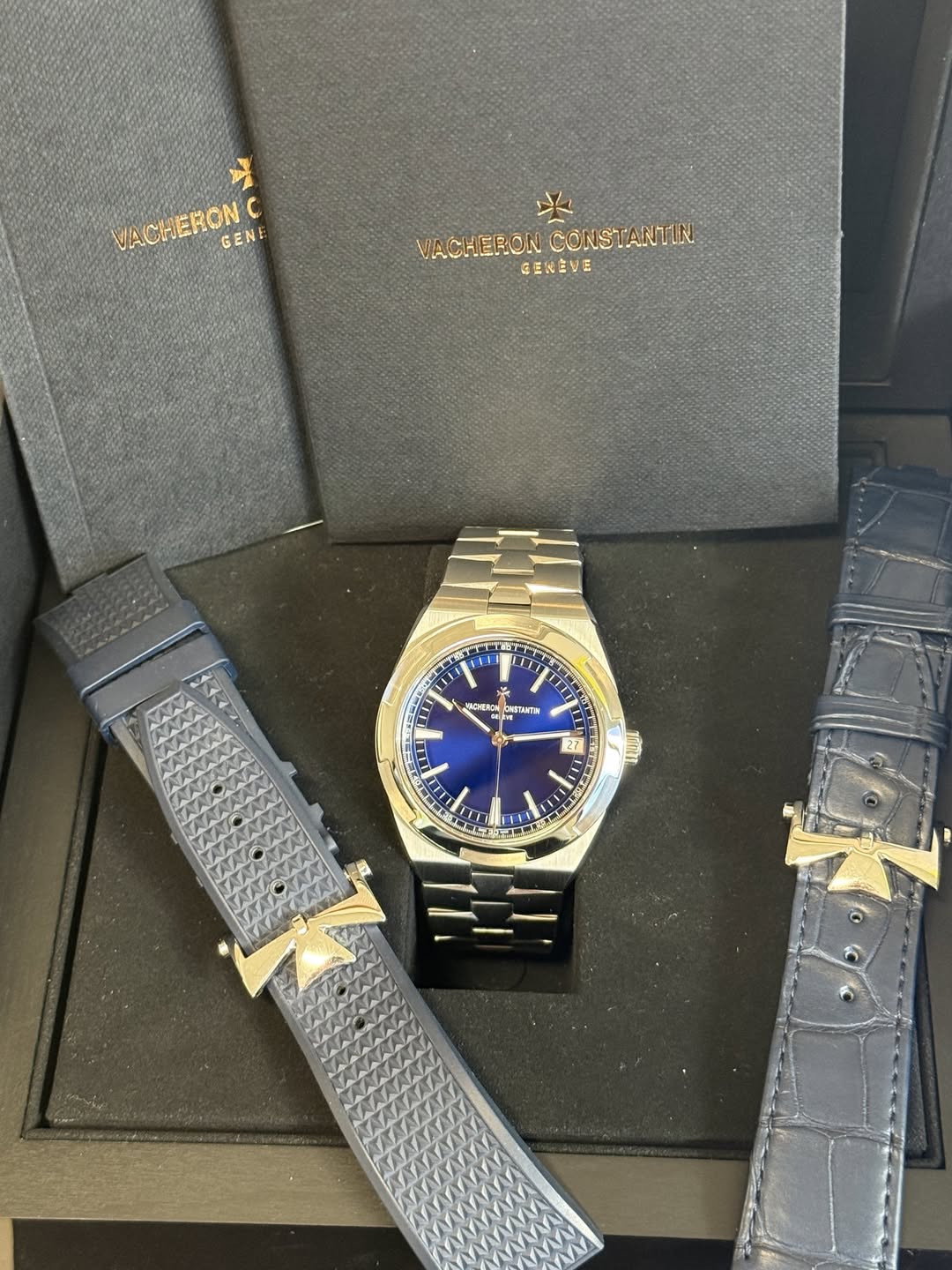 May be an image of wrist watch and text