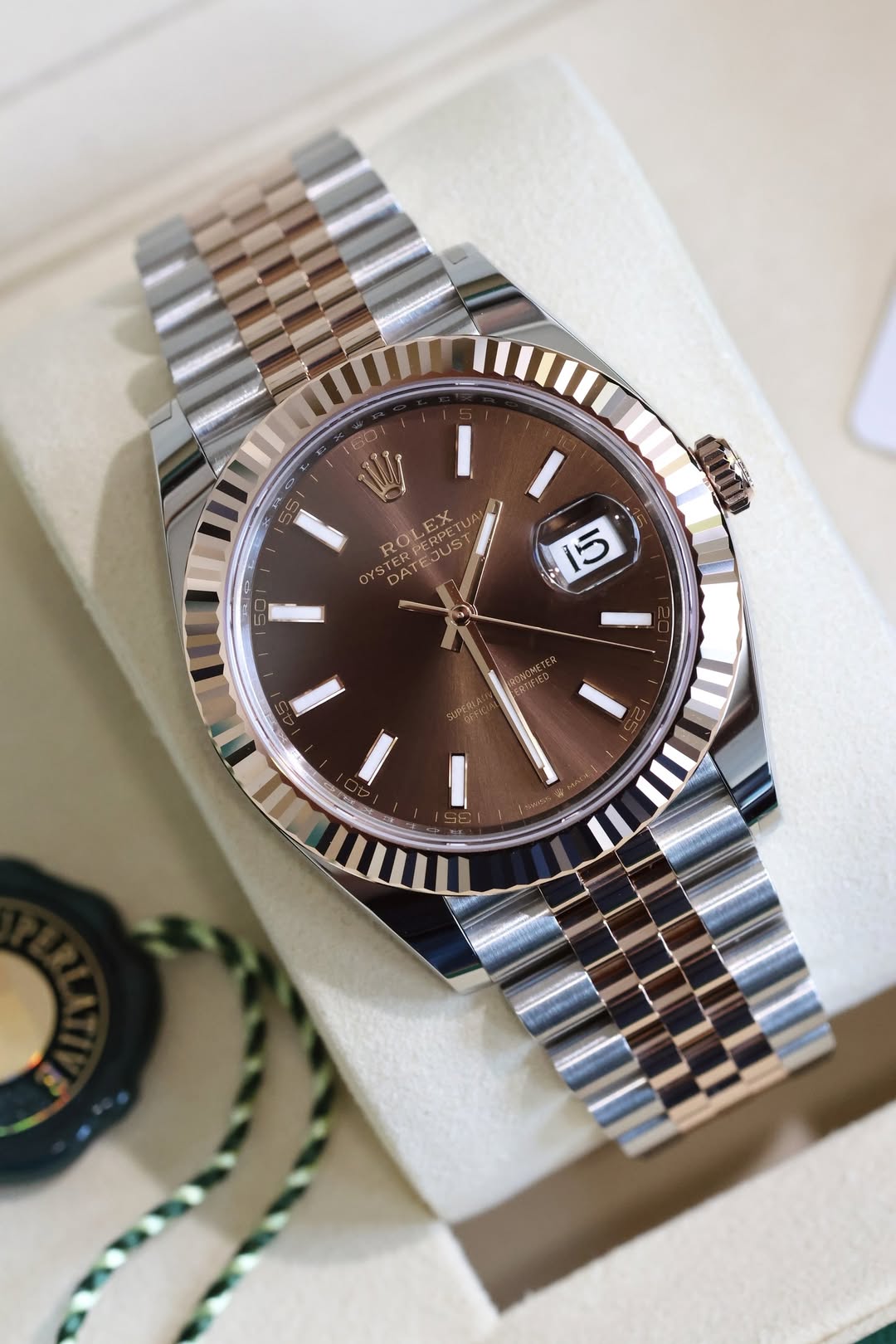 May be an image of wrist watch and text
