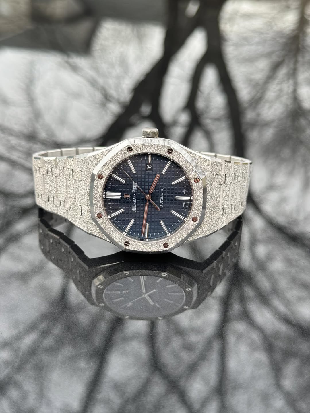 May be an image of wrist watch and text