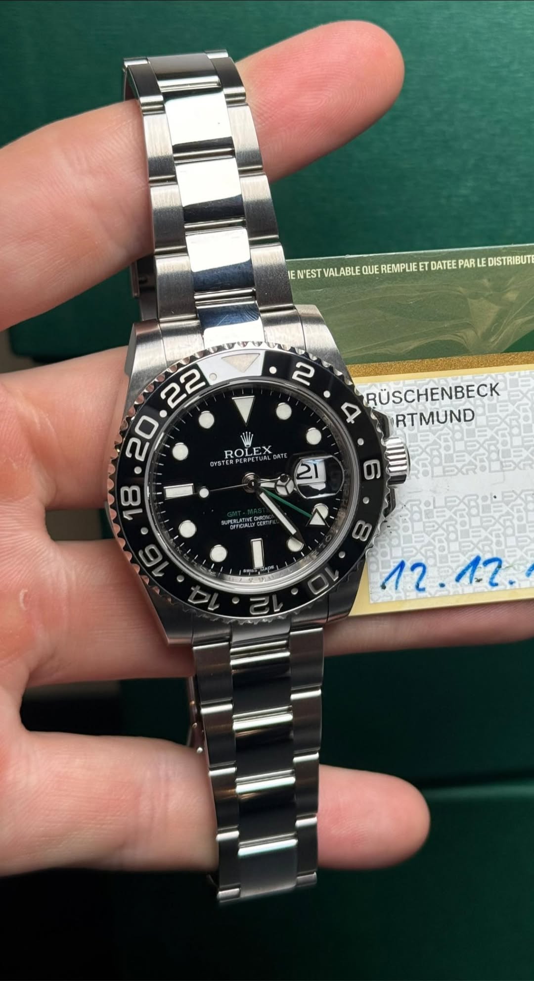 May be an image of wrist watch and text