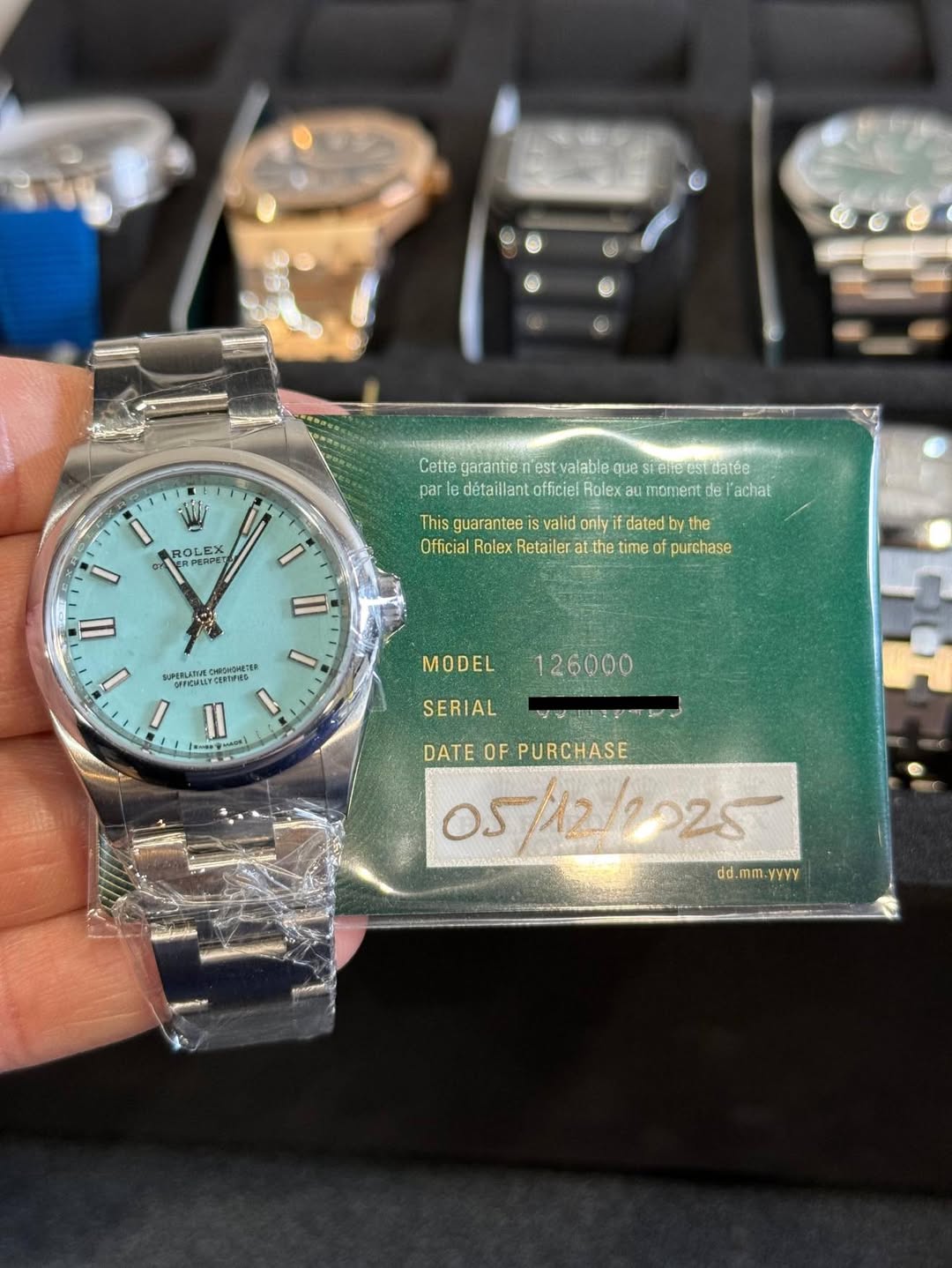 May be an image of wrist watch and text
