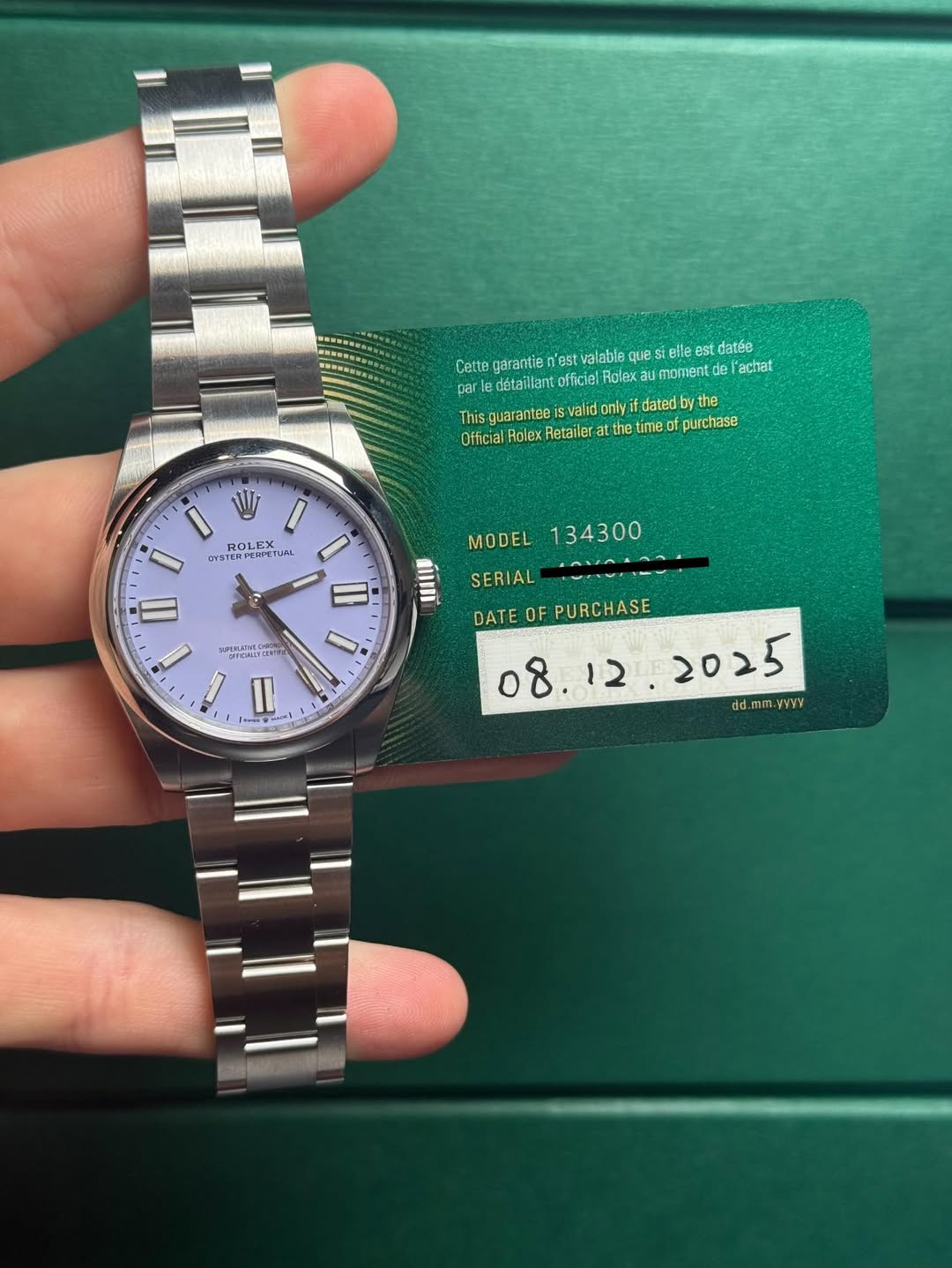 May be an image of wrist watch and text that says 'St datée Cette garantie est Fettpeariaete valablaq officiel Rolex momentde achat This guarantee valid only dated Official RDIEX…