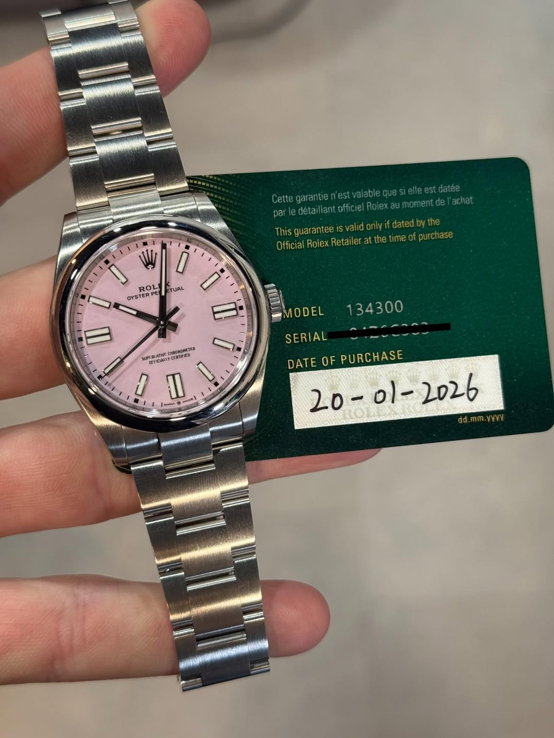May be an image of wrist watch and text