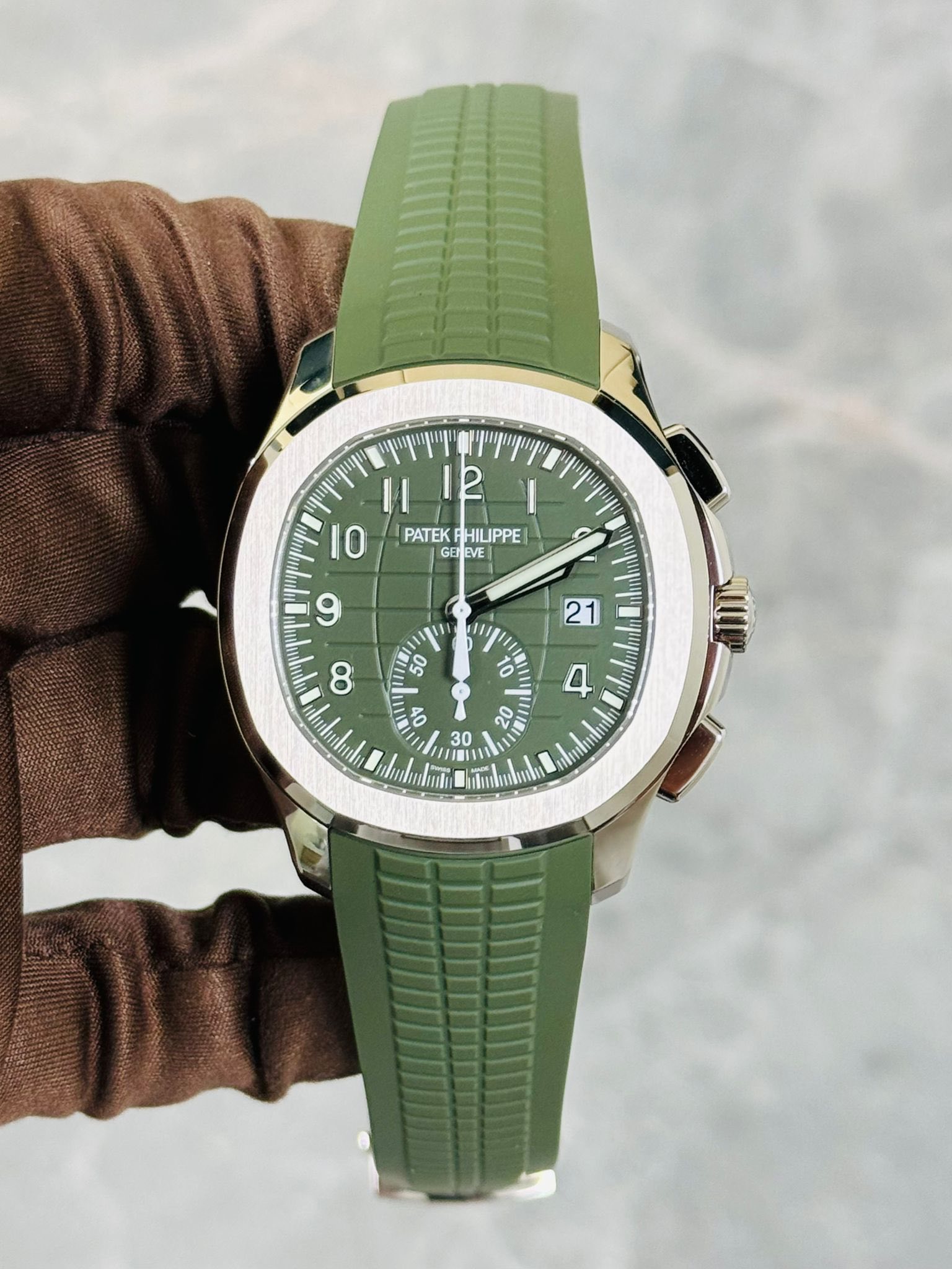 May be an image of wrist watch and text