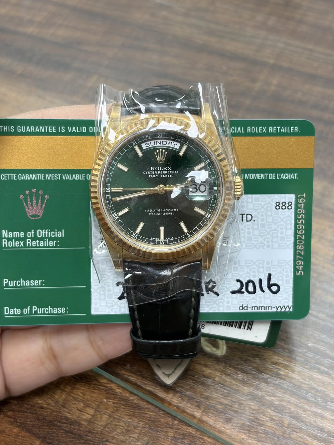 May be an image of digital watch and text that says 'HIS GUARANTEE GUARANTEEISVA IS VALID OI XII SUNDAY SUN CIAL ROLEX CIALROLEXRETAILER. RETAILER. CETTE GARANTIE N'EST VALABLE…