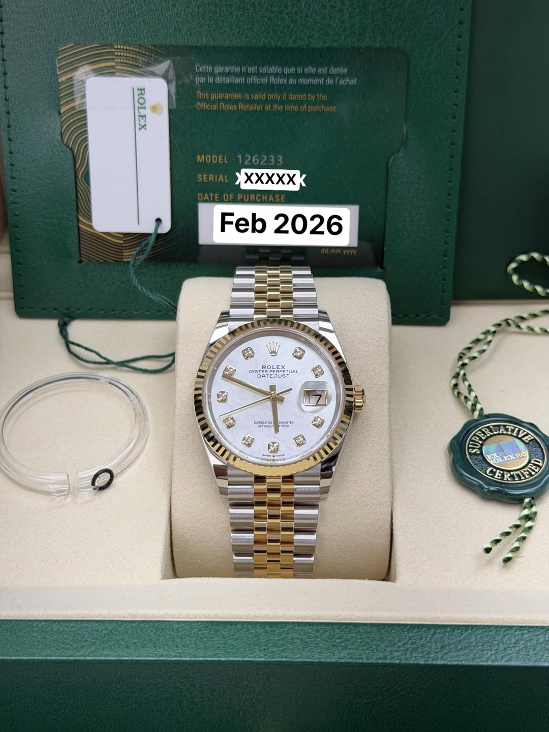 May be an image of wrist watch and text