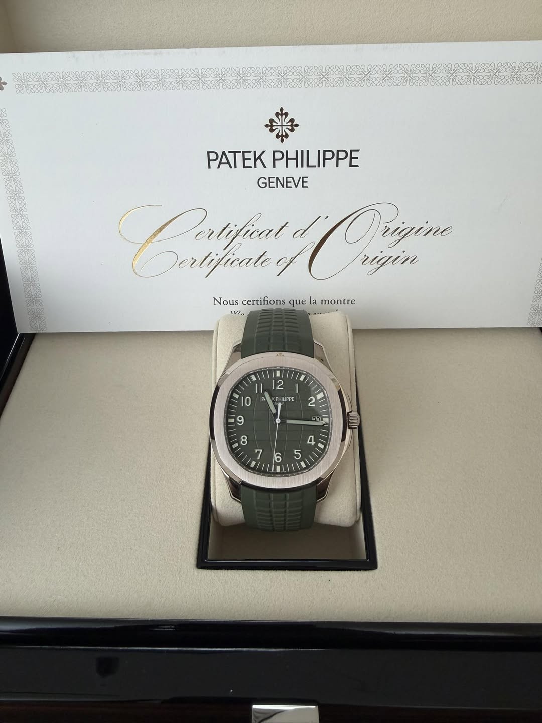 May be an image of wrist watch and text that says 'PATEK PHILIPPE GENEVE Caatfu rlificat Orern Origine Dertificate rigin Nous certifions que Nouscertifionsquelamontte la montre…