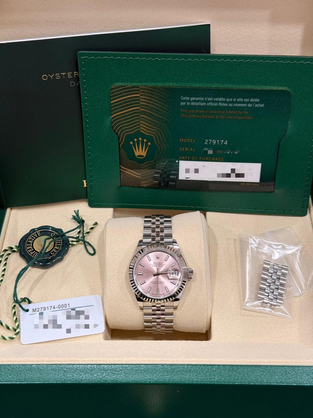 May be an image of wrist watch and text