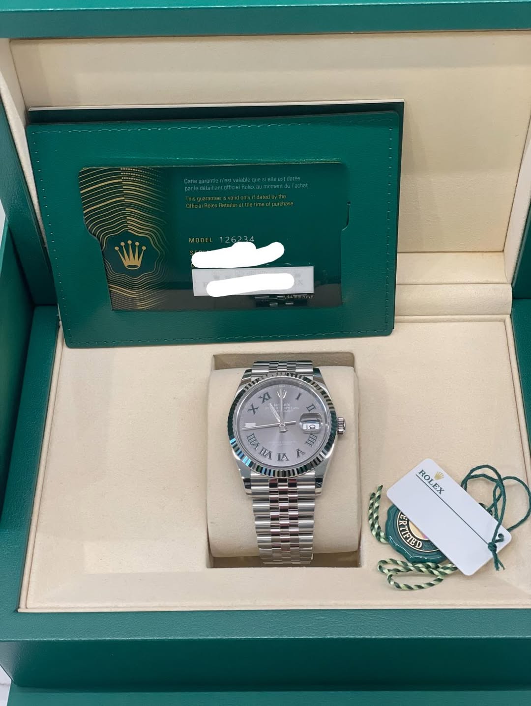 May be an image of wrist watch and text that says 'A K + ラっ士 ل ከማ भार E D ΠΑ IA ROLEX RO W EX RTIFTED'