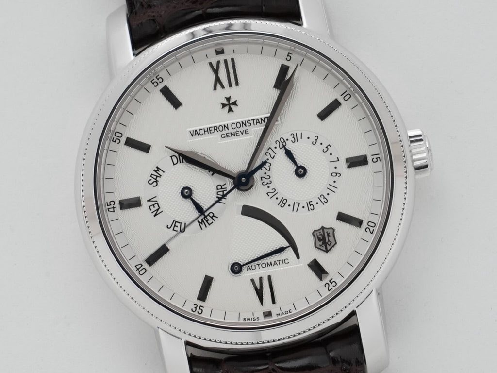 May be an image of wrist watch and text that says '55 XII 50 10 VACHERON GENEVE C 28- CONSTANT 3 •5. DI SAM MAR №3Л 13 EU MER 20 45 15 Ot S6 25 AUTOMATIC ١٨ SWISS MADE'