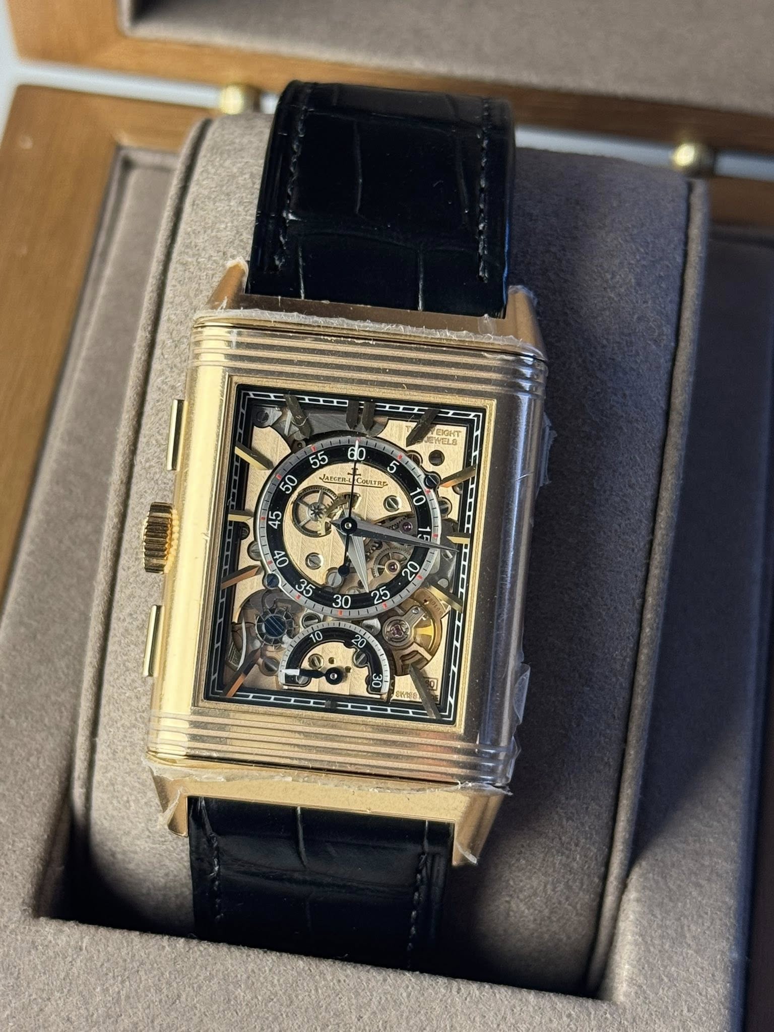 May be an image of wrist watch and text