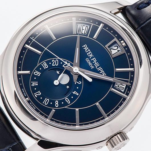 May be an image of wrist watch and text that says 'e WED PATEK PATEKPHILIPP 2 N GENEVE PHILIPPP 18 20 91 如 요워서와 टा O 9 8'