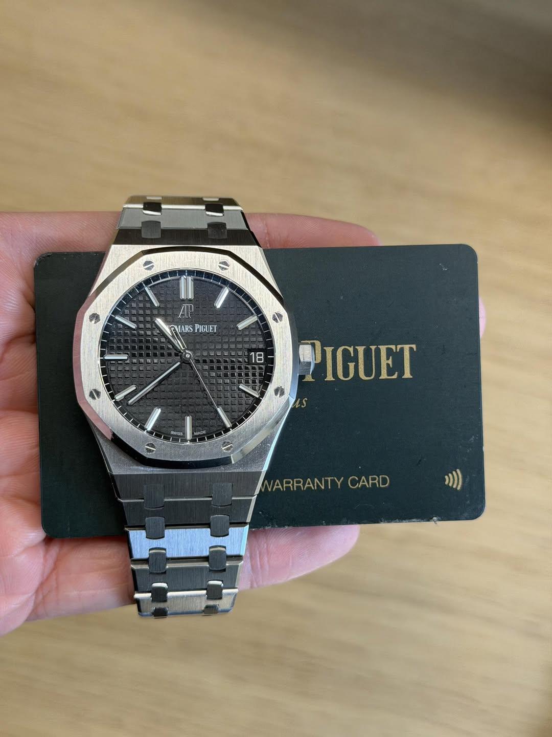May be an image of wrist watch and text that says 'S ሆ 平 EHARS THARSPIGLET PICLET क 18 1 Becor PIGUET HADO NARRANTY WARRANTYCARD CARD )))'