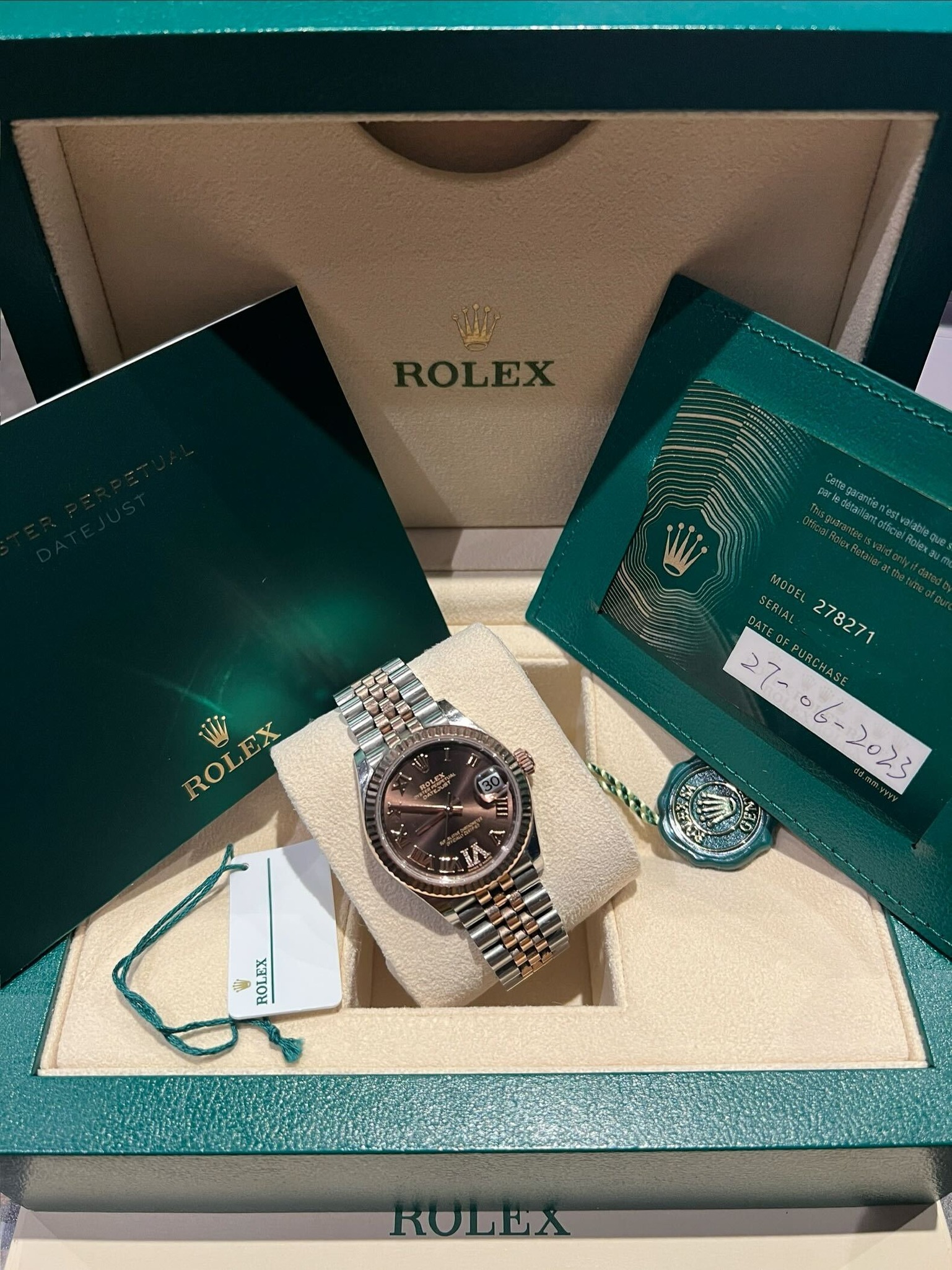 May be an image of wrist watch and text that says 'DERIA SERIA. CcRTA MODEL DATE OF OFPUSCHAS 2023 S ع ROLEX 生 20 門美 עסדני RODA'