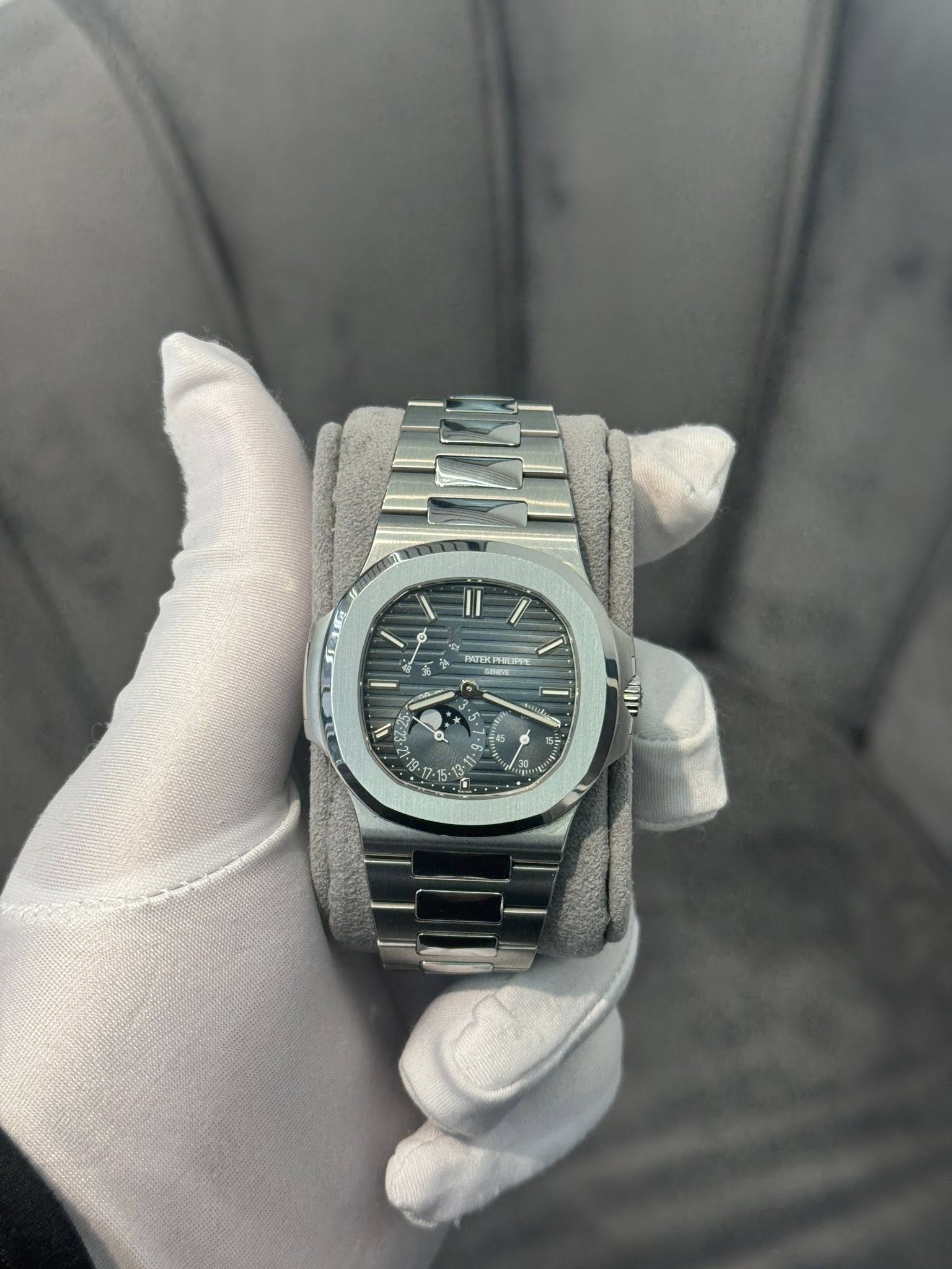 May be an image of wrist watch and text