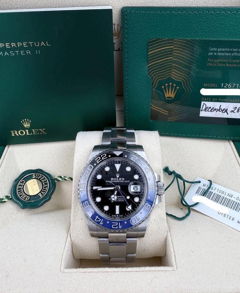 May be an image of wrist watch and text that says 'ERPETUAL ASTER 11 Certegaranten'est parle.detarilant.offici flici 12671 ROLE PURCHASE December 2 S 22 0 FTED ROLEX SIRA DATE ROLE…
