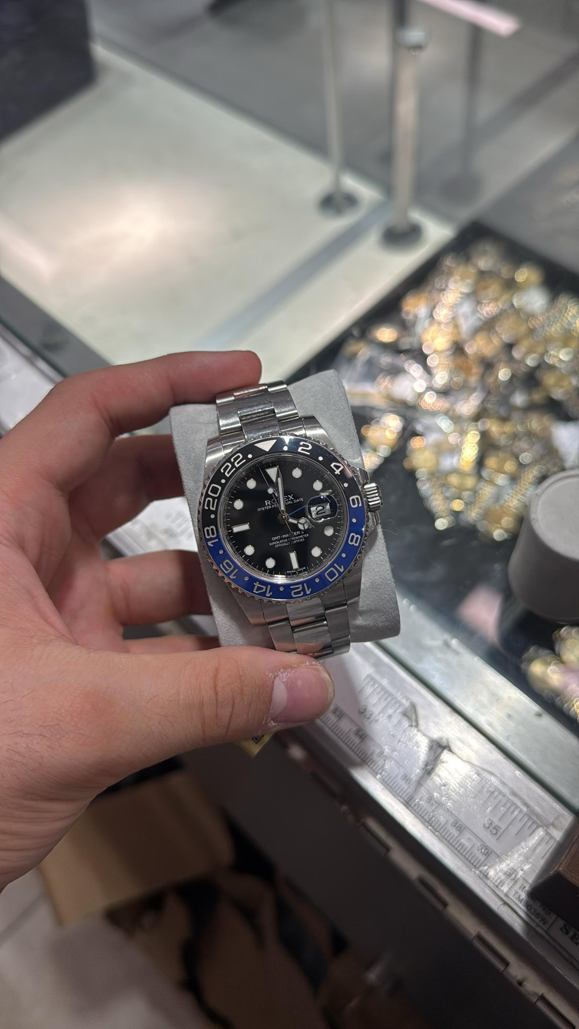 May be an image of wrist watch and text