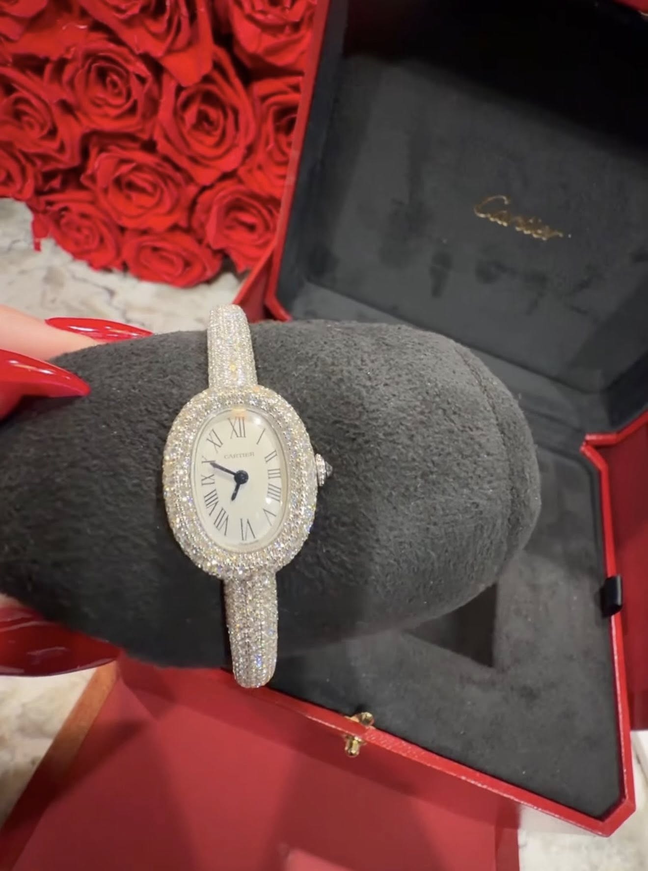 May be an image of wrist watch and text