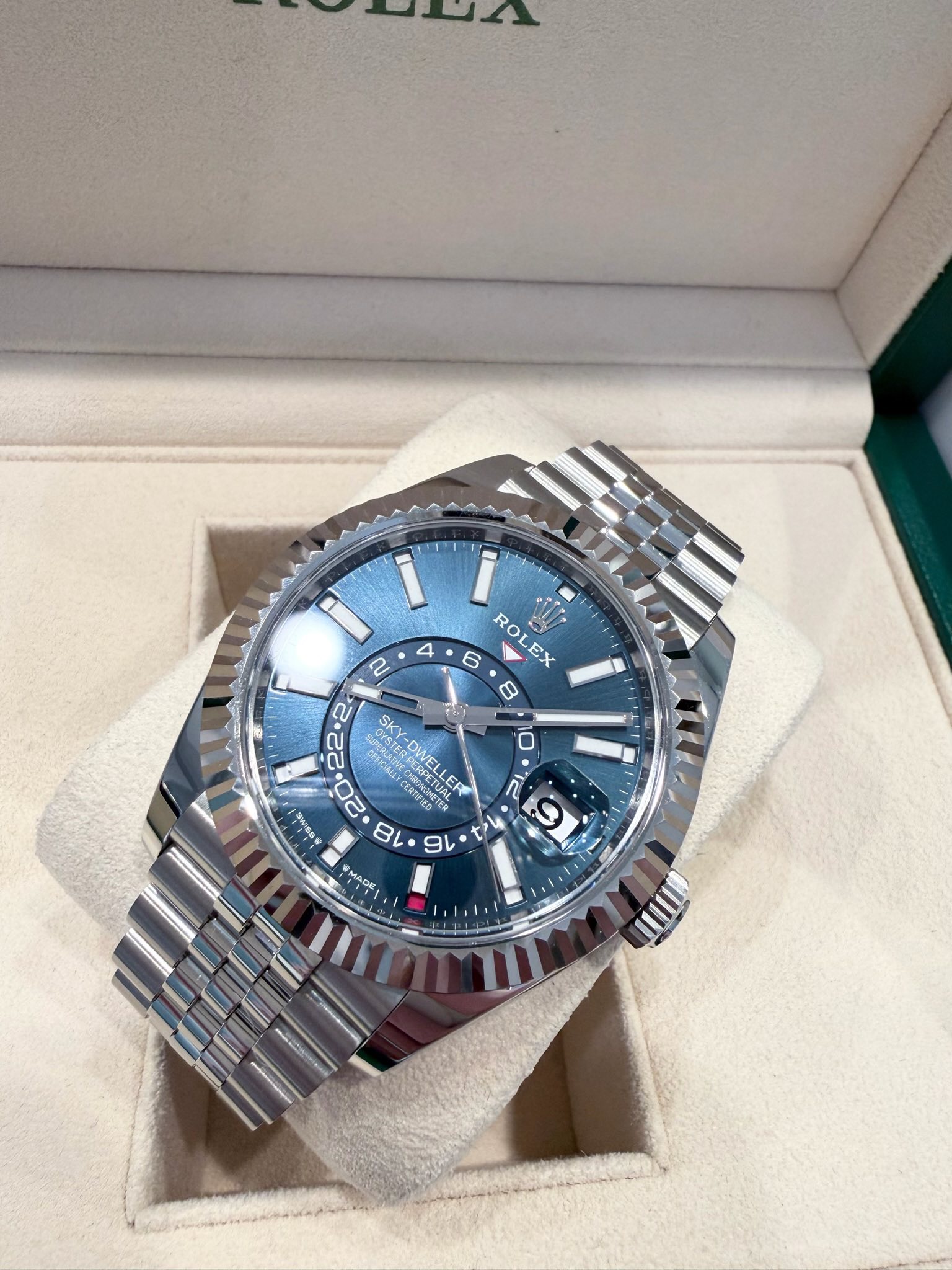 May be an image of wrist watch and text