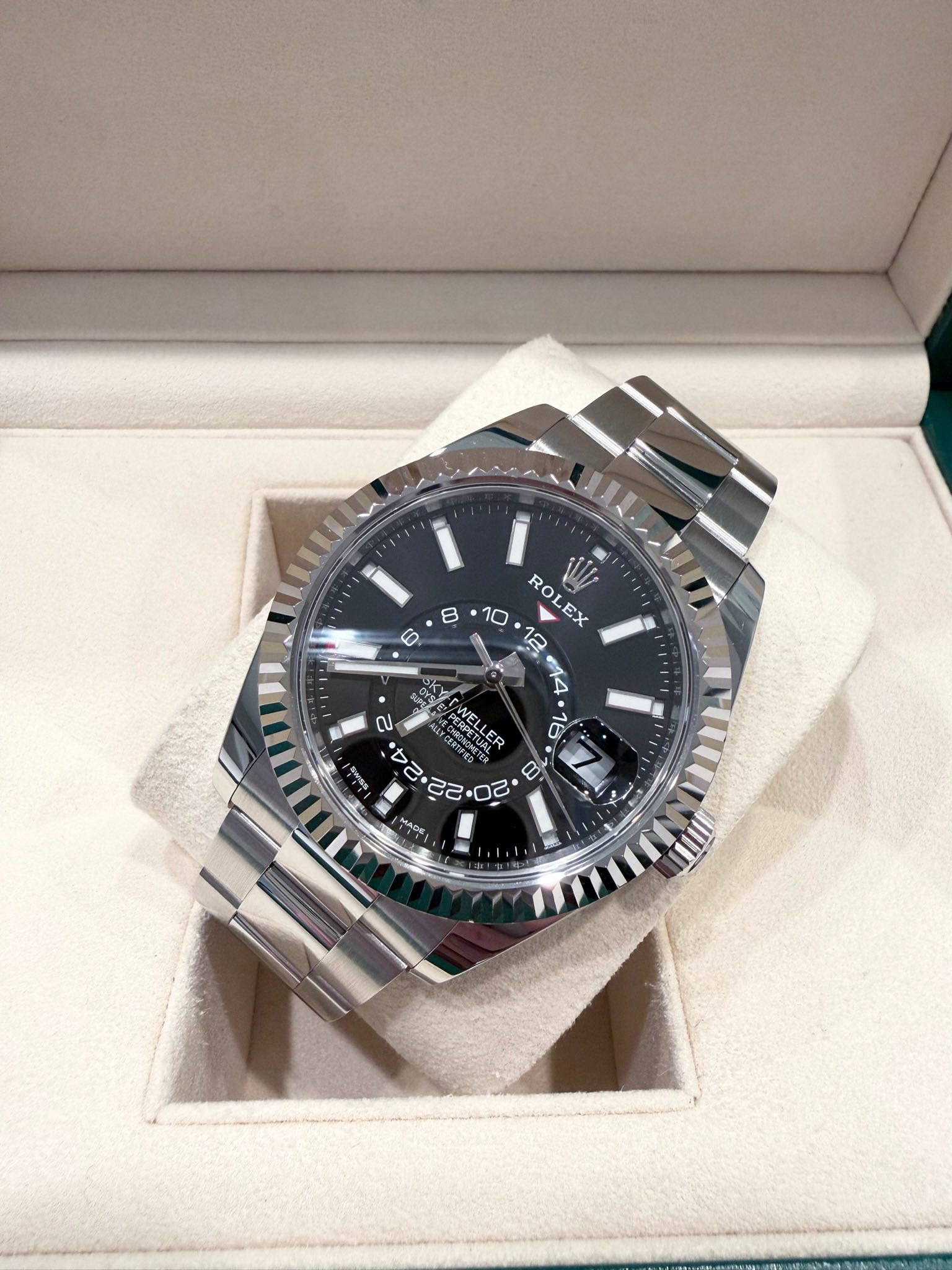 May be an image of wrist watch and text