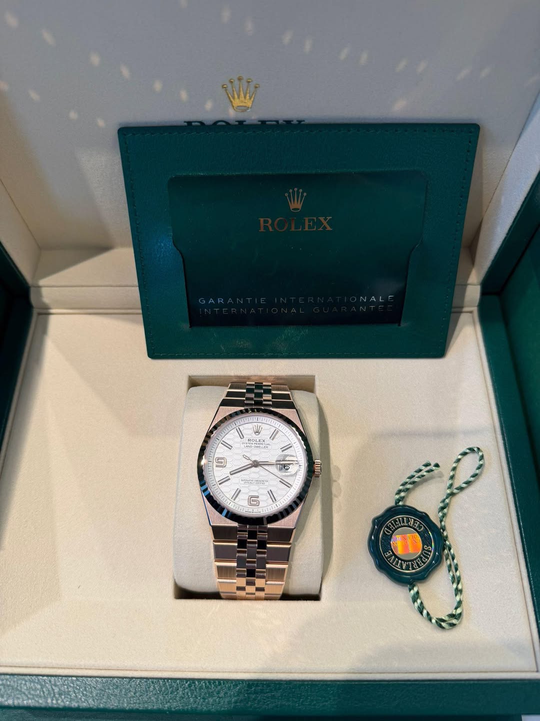 May be an image of wrist watch and text