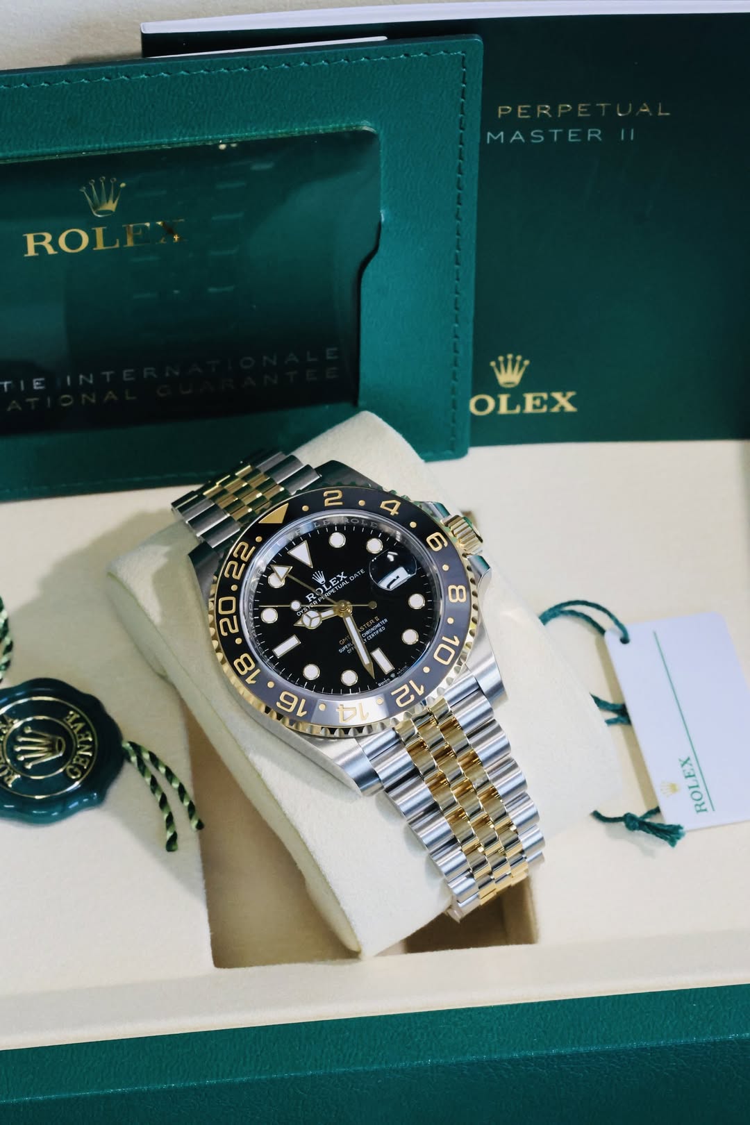 May be an image of wrist watch and text