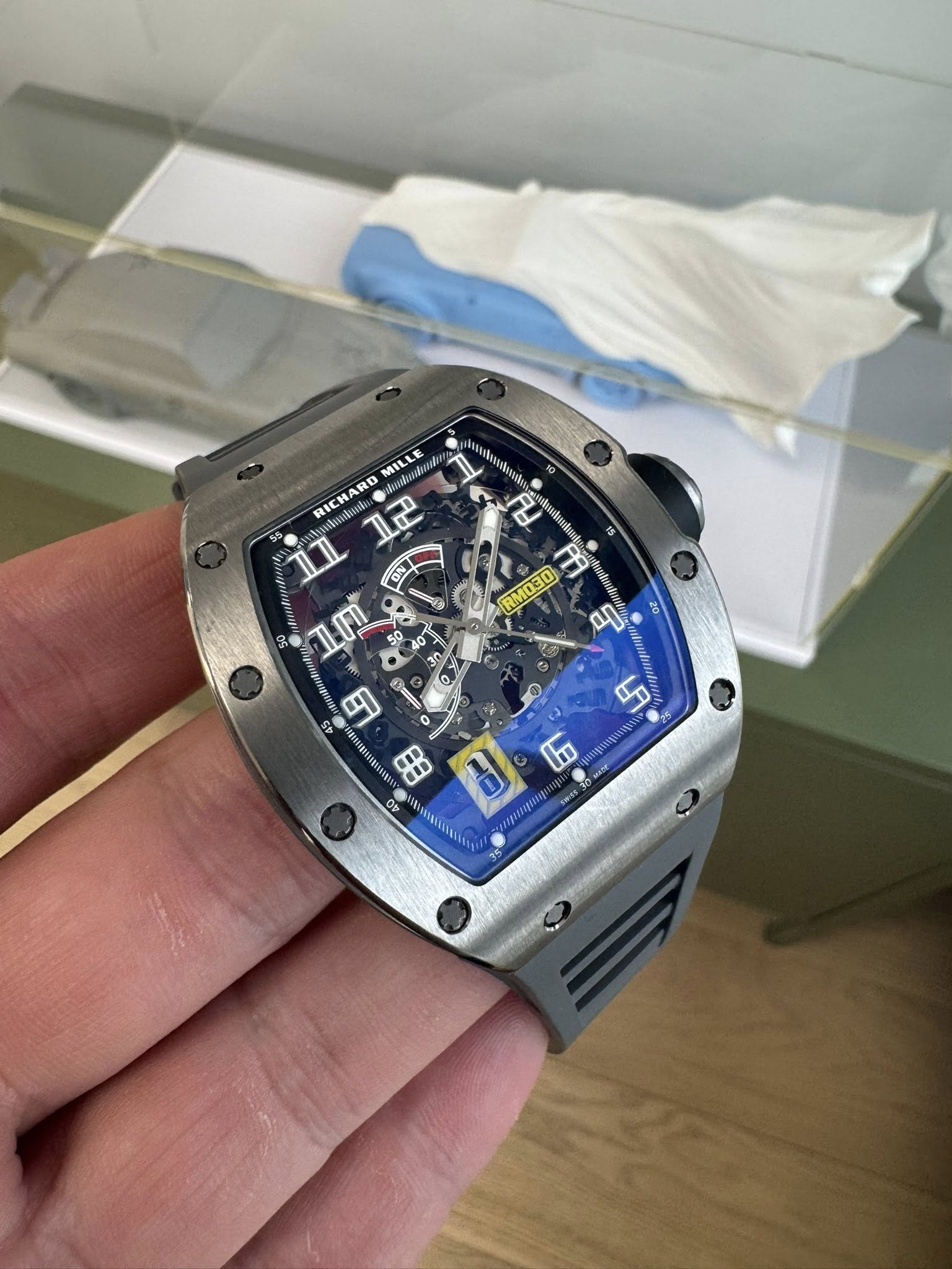 May be an image of wrist watch and text