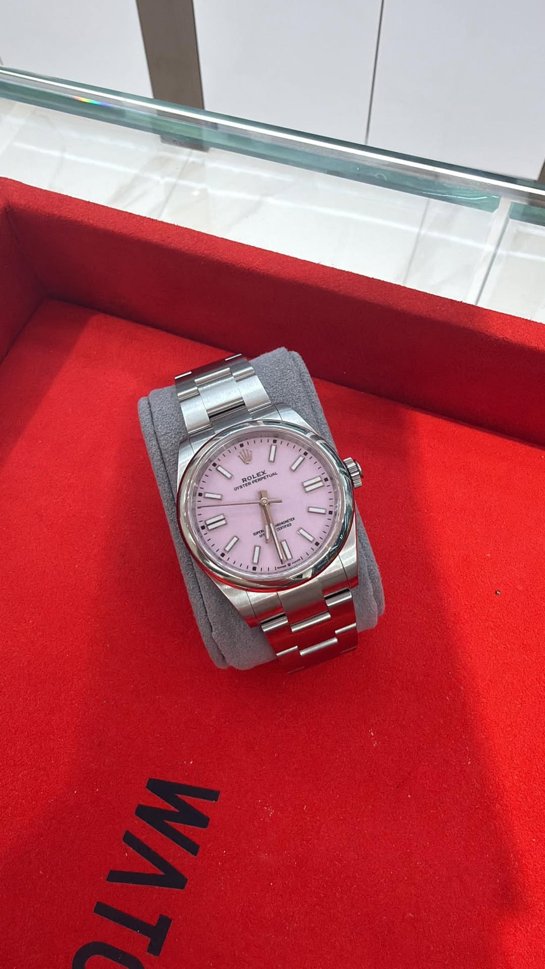 May be an image of wrist watch and text