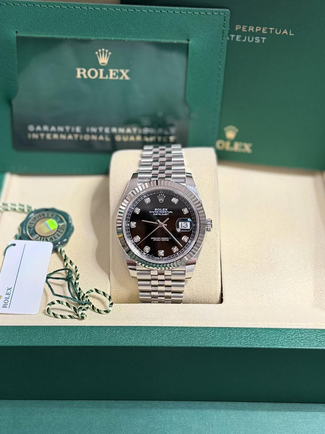 May be an image of wrist watch and text