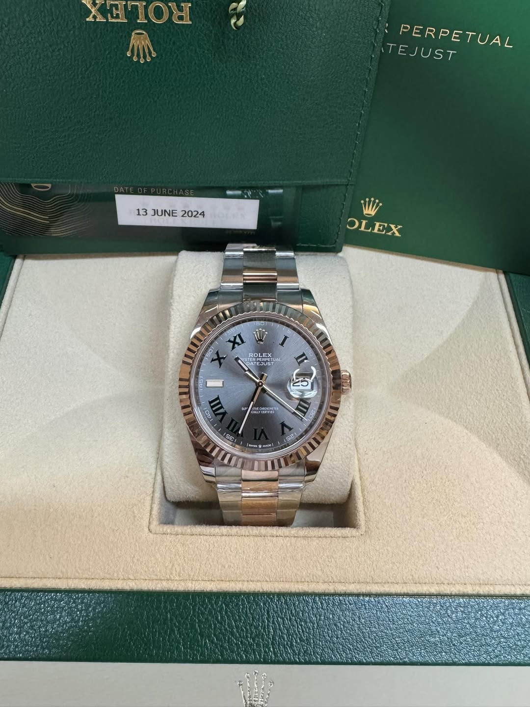 May be an image of wrist watch and text that says 'ΧWHOΥ PERPETUAL TEJUST 13 JUNE 13JUNE2024 JUNE2024 2024 OLEX XI 117 150 ROLビX LEX EX KJ.INT I ac AII III IT 25 قش 時 ش se.'