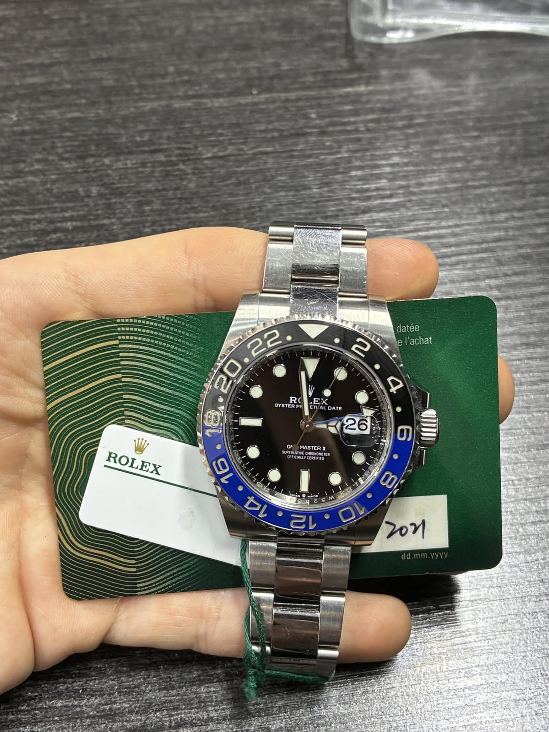 May be an image of wrist watch and text