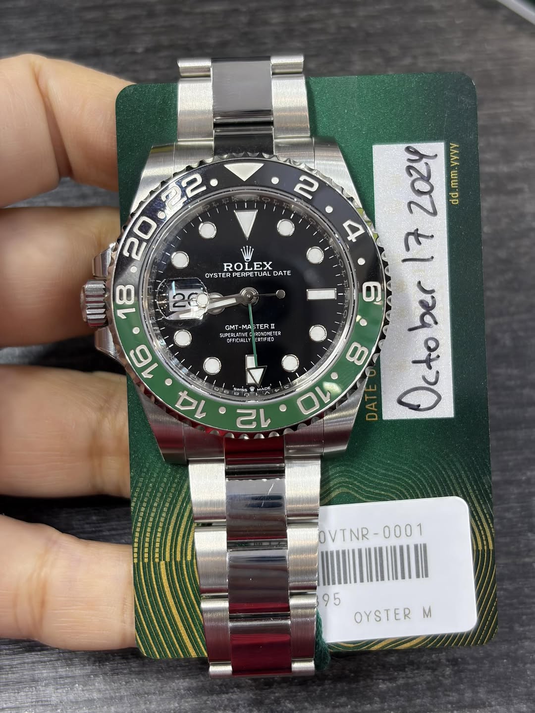 May be an image of wrist watch and text that says '2 20 ROLEX EX OYST STERPERPETUAL DATE 20 18 CMT - ROMMETER OMOMETER CFTIDALLY RTIFED yyyy 2 2024 dd mm 4 17 O しす ၂၁၄၀၁ ber 8…