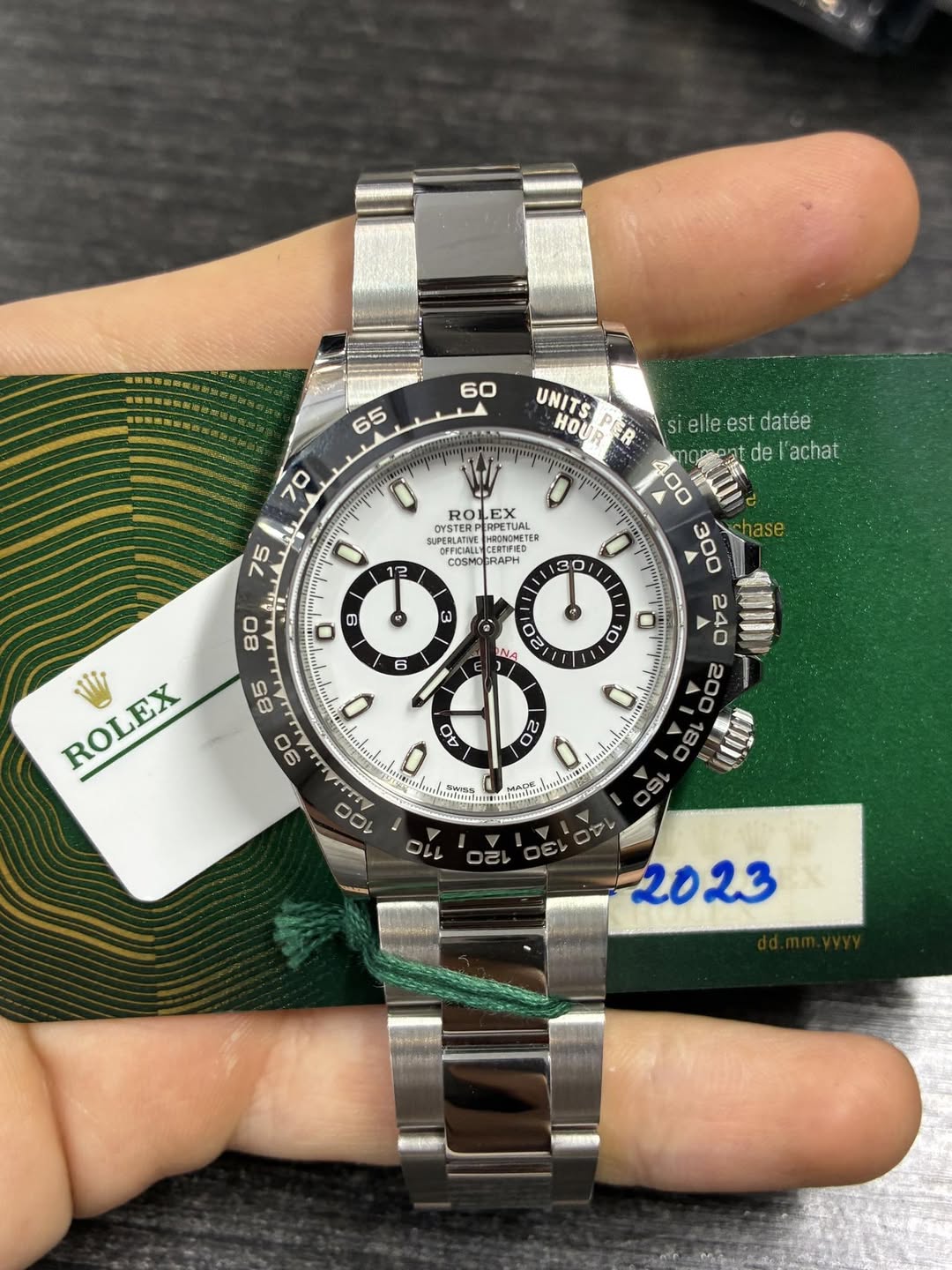 May be an image of wrist watch and text