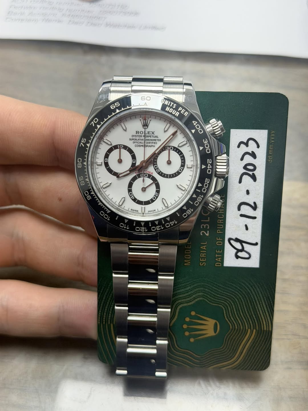 May be an image of wrist watch and text