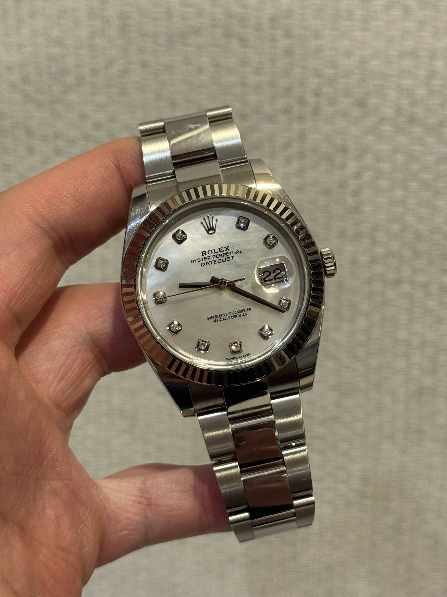 May be an image of wrist watch and text that says 'W OYS YSTERPERPI DATEJUST STERFE ROLEX UAL 広 И3'