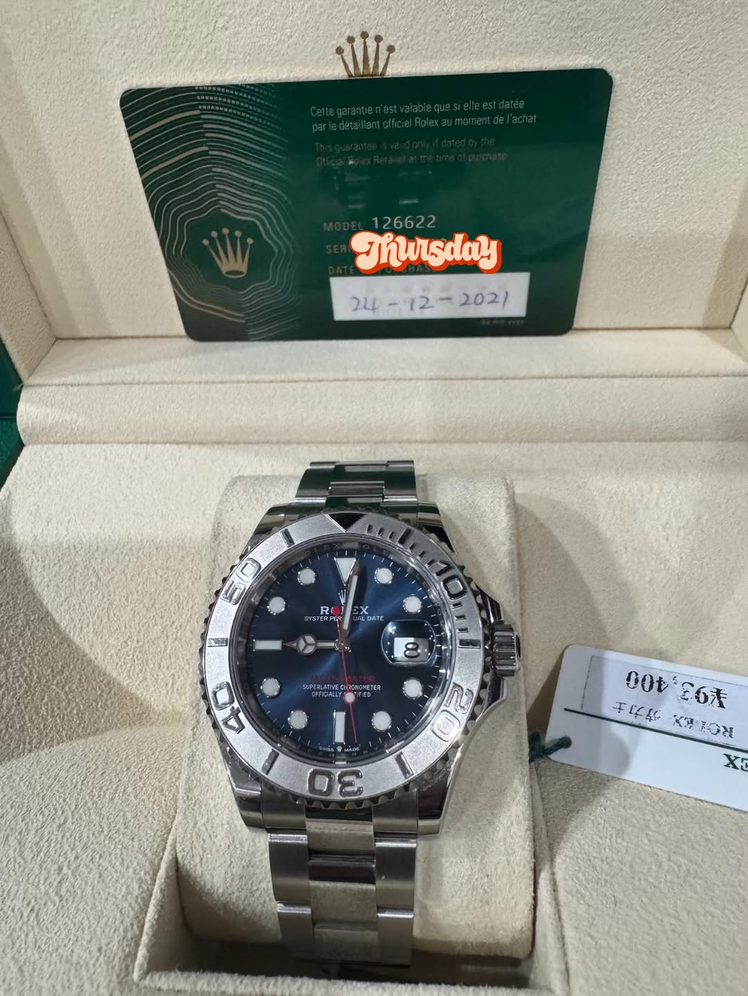 May be an image of wrist watch and text